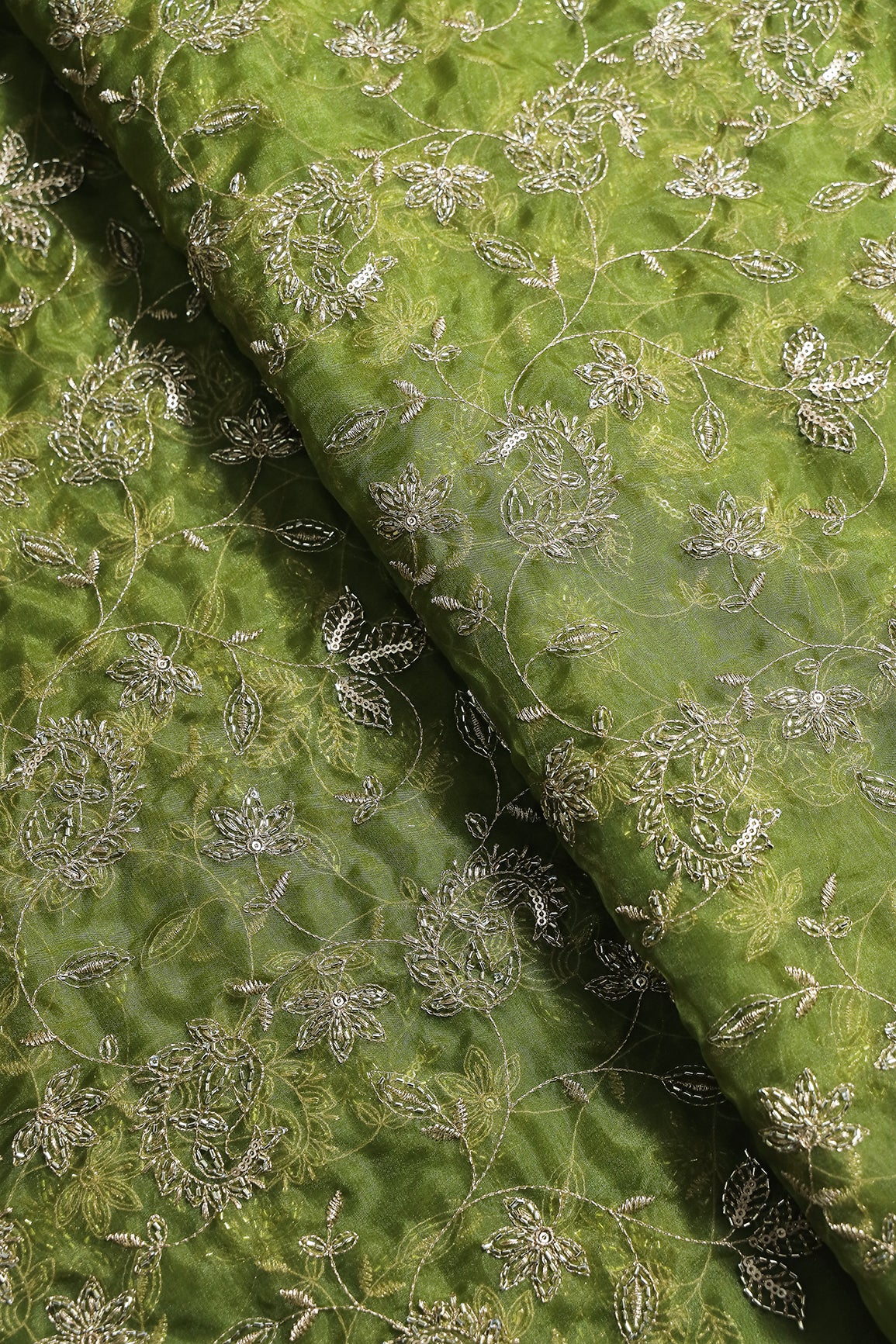 Gold Sequins & Beads With Zari Floral Leafy Paisley Embroidery Work On Green Organza Fabric