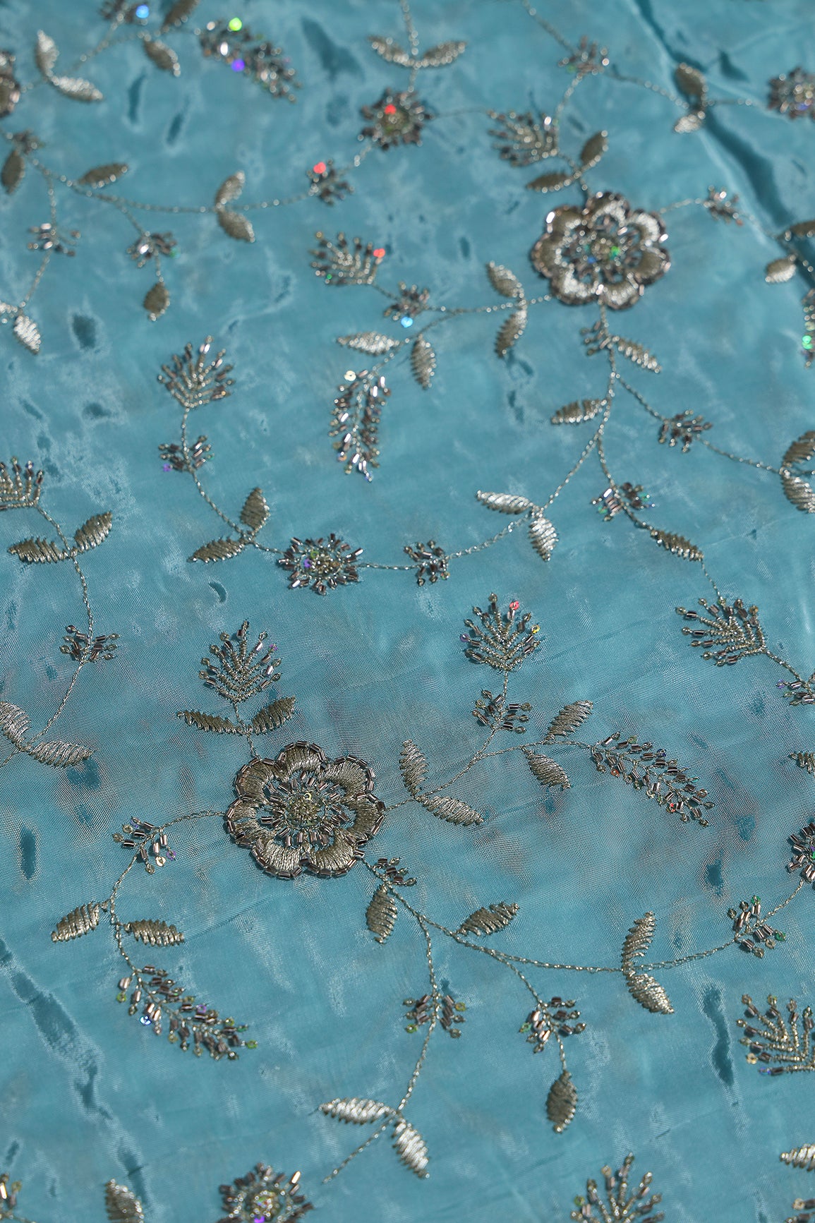 Multi Sequins & Beads With Zari Floral Leafy Embroidery Work On Light Blue Glass Tissue Organza Fabric