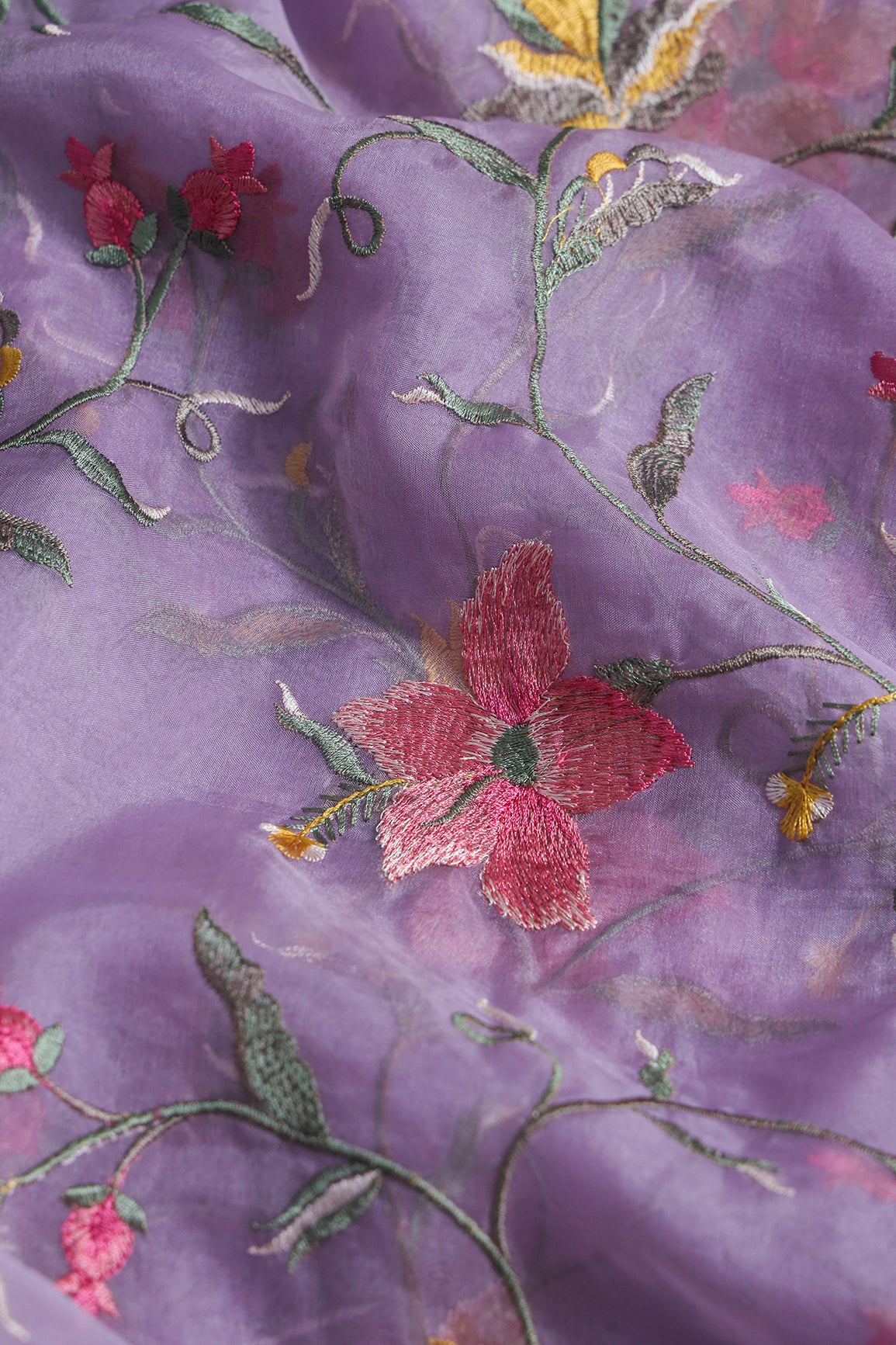 Elegant Floral Multi Color Thread Embroidery Work On Lavender Organza Fabric