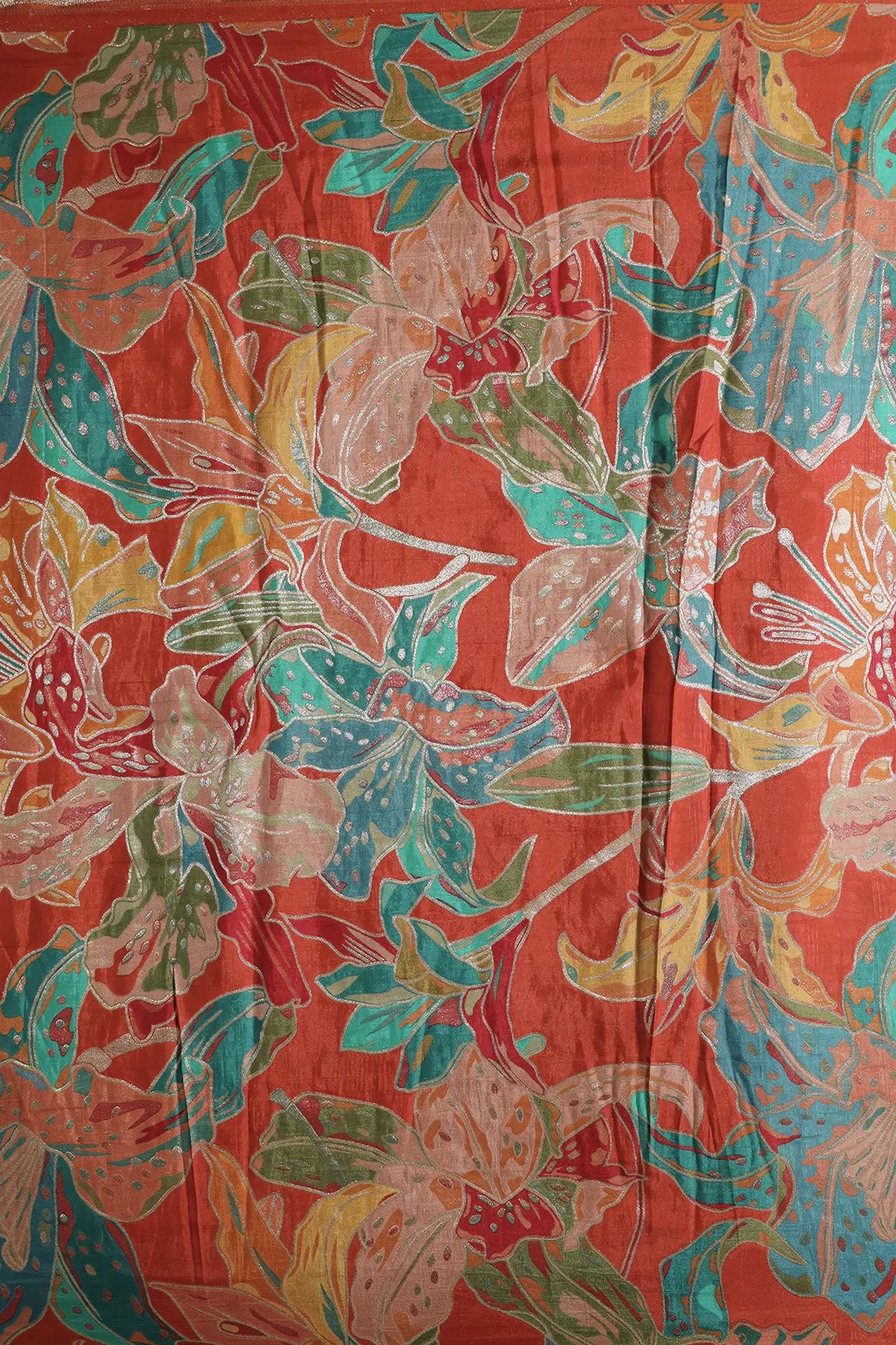 Positional Floral Zari Print On Rust Orange Viscose Dola Silk Jacquard Fabric