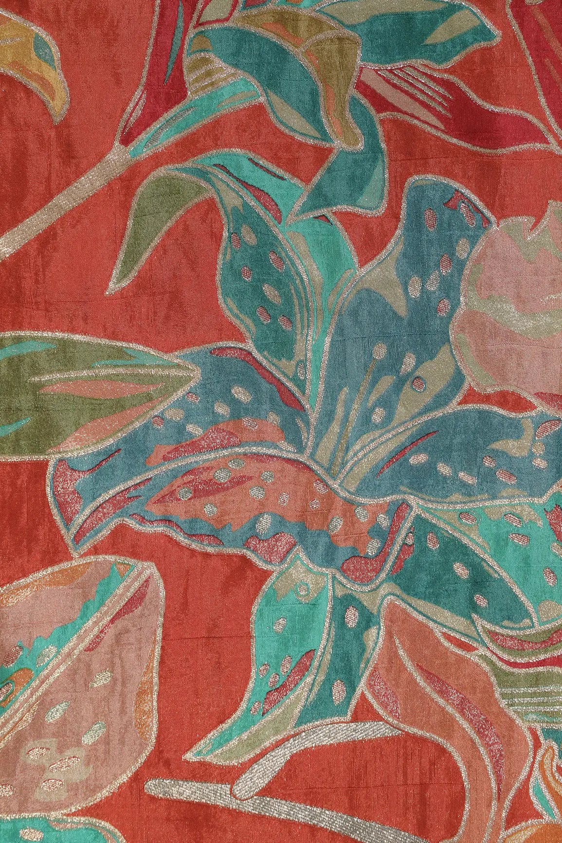 Positional Floral Zari Print On Rust Orange Viscose Dola Silk Jacquard Fabric