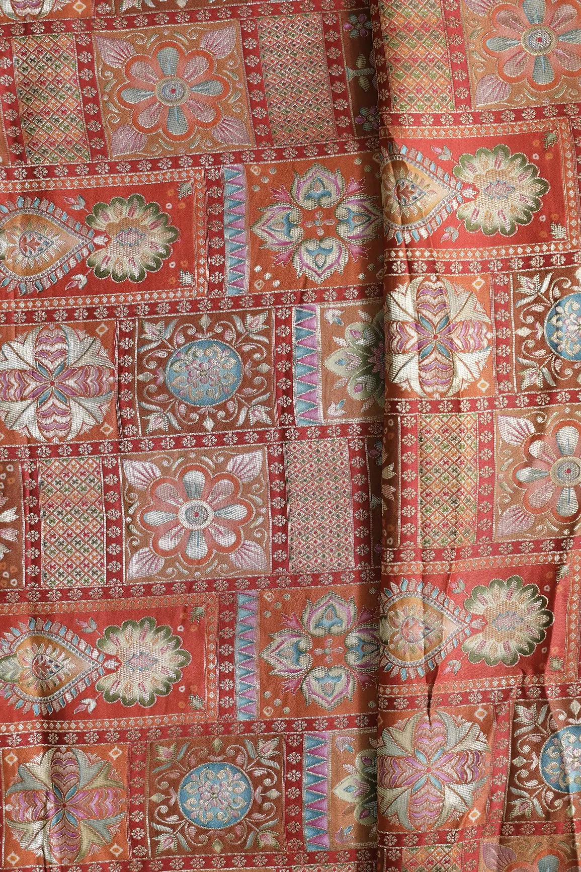 Positional Floral Zari Print On Orange Viscose Dola Silk Jacquard Fabric