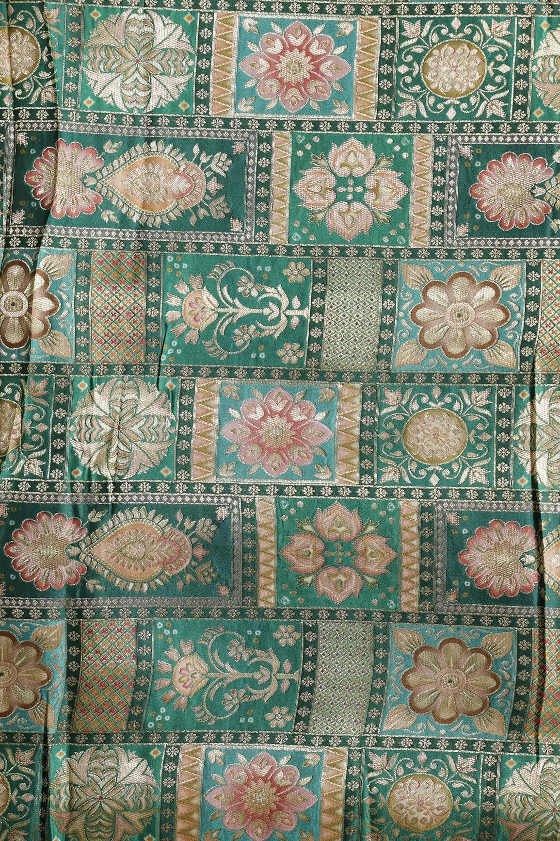 Positional Floral Zari Print On Green Viscose Dola Silk Jacquard Fabric
