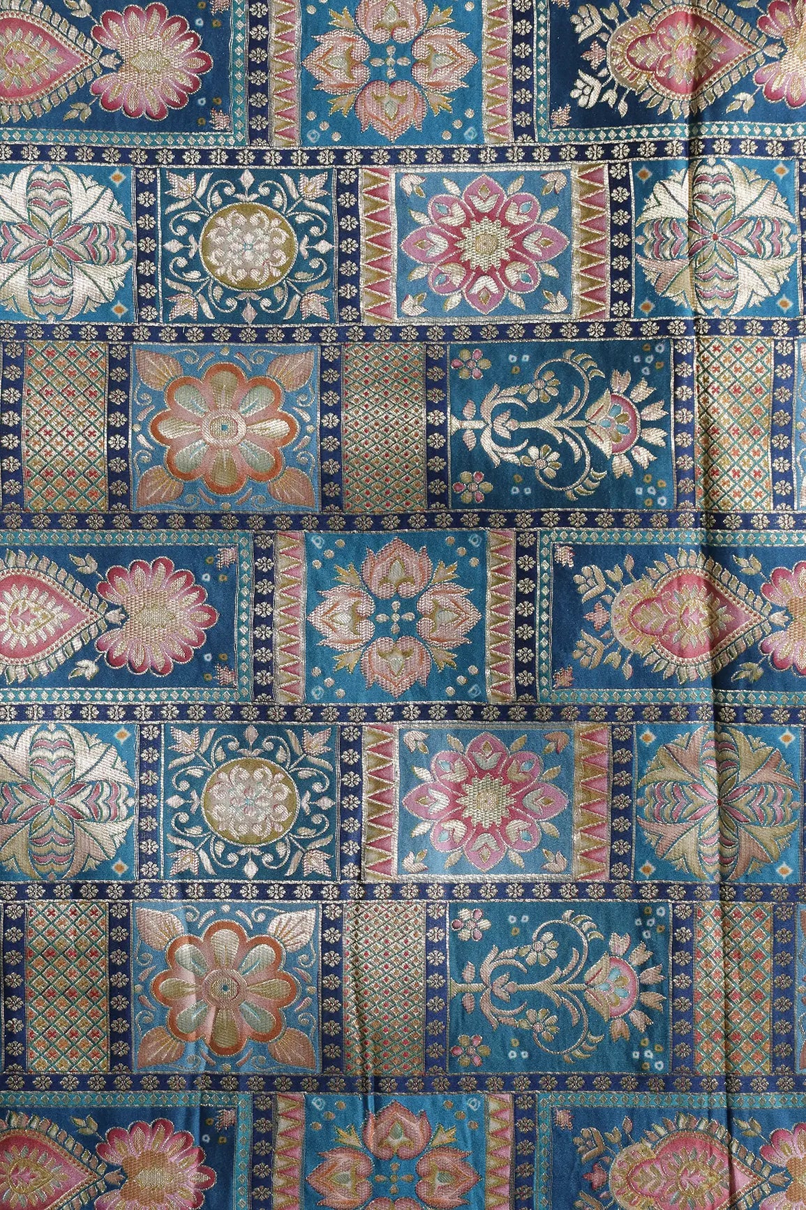 Positional Floral Zari Print On Rama Blue Viscose Dola Silk Jacquard Fabric