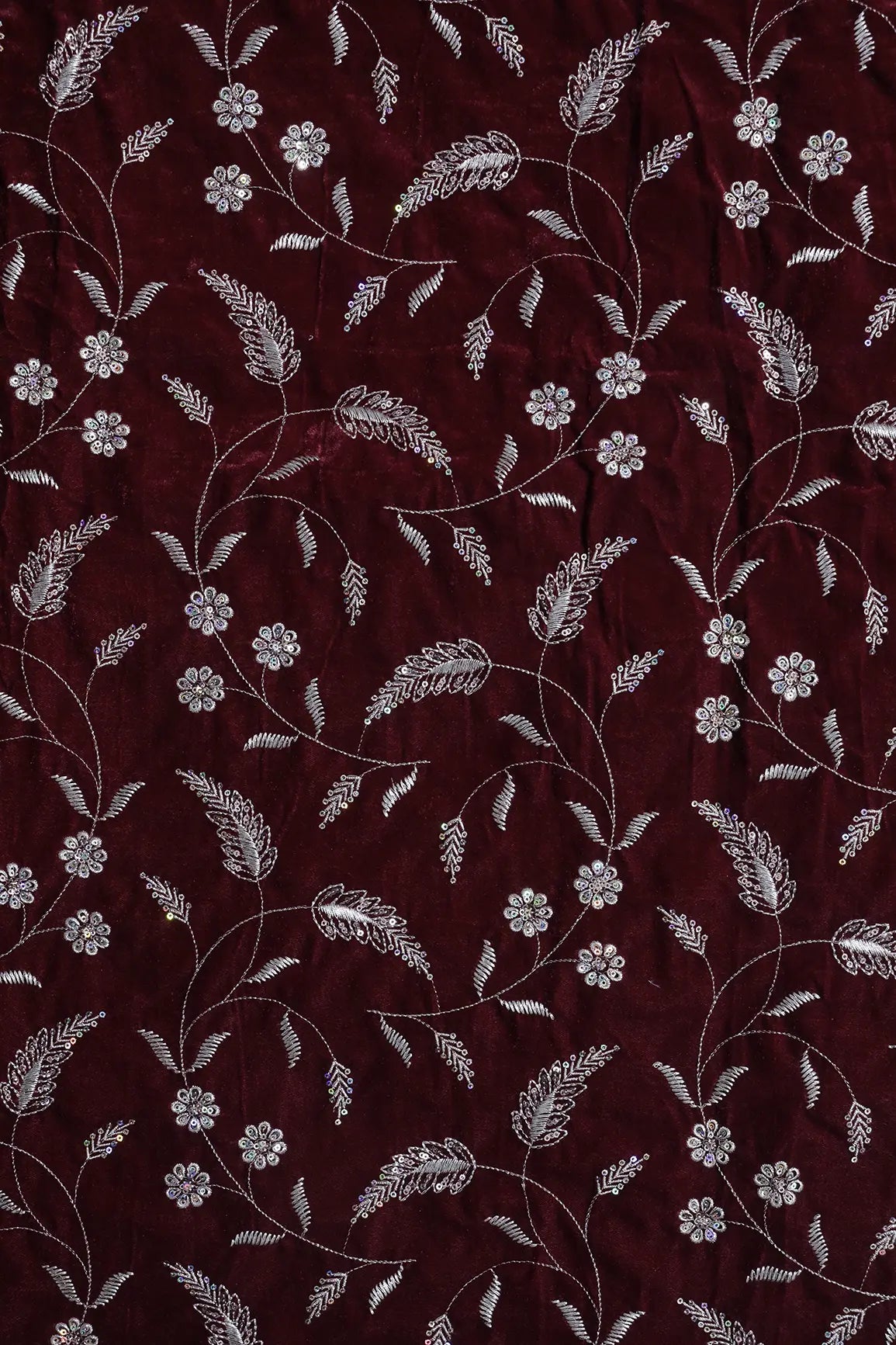 Gold Sequins With Gold Zari Floral Leafy Embroidery Work On Maroon Velvet Fabric