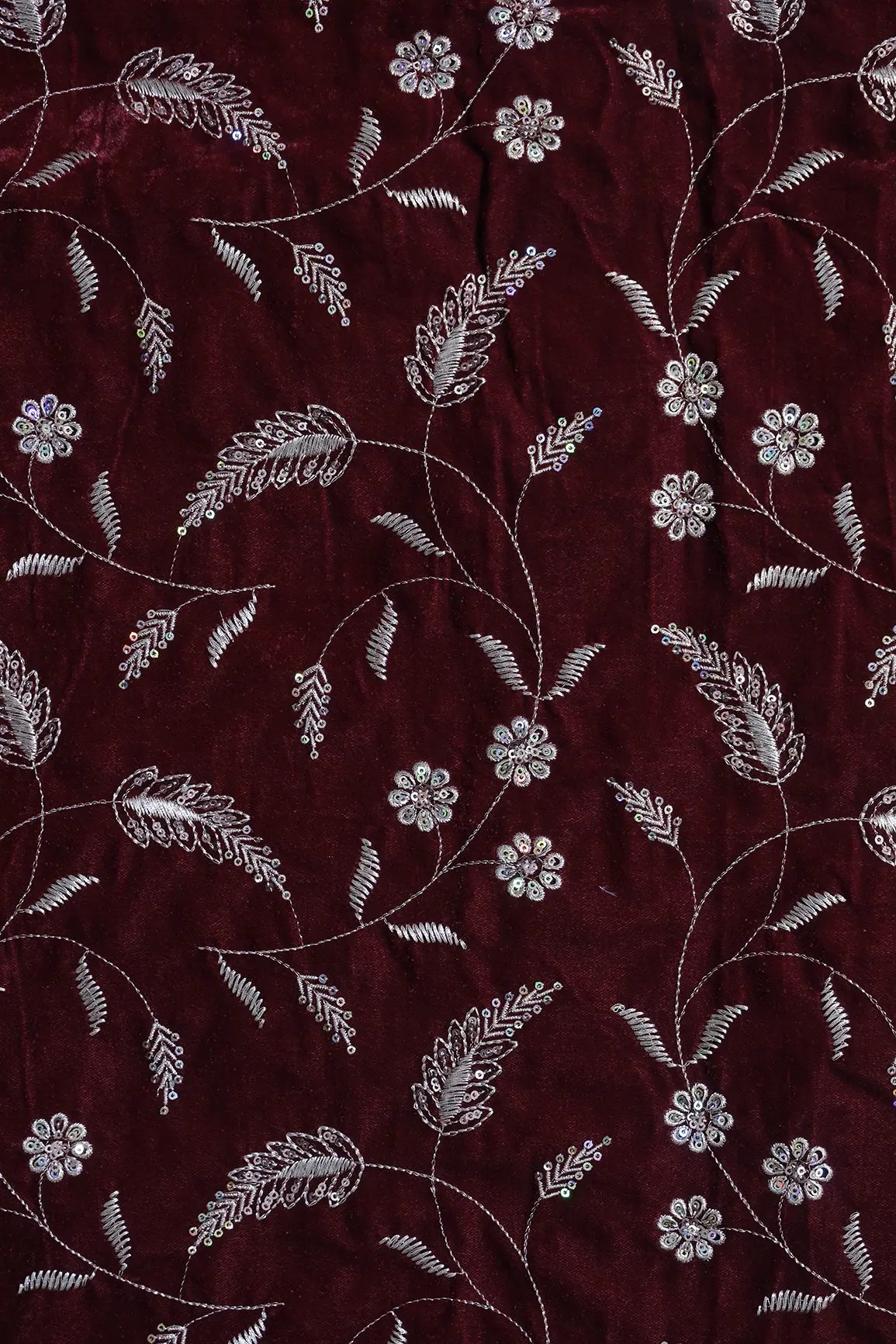 Gold Sequins With Gold Zari Floral Leafy Embroidery Work On Maroon Velvet Fabric