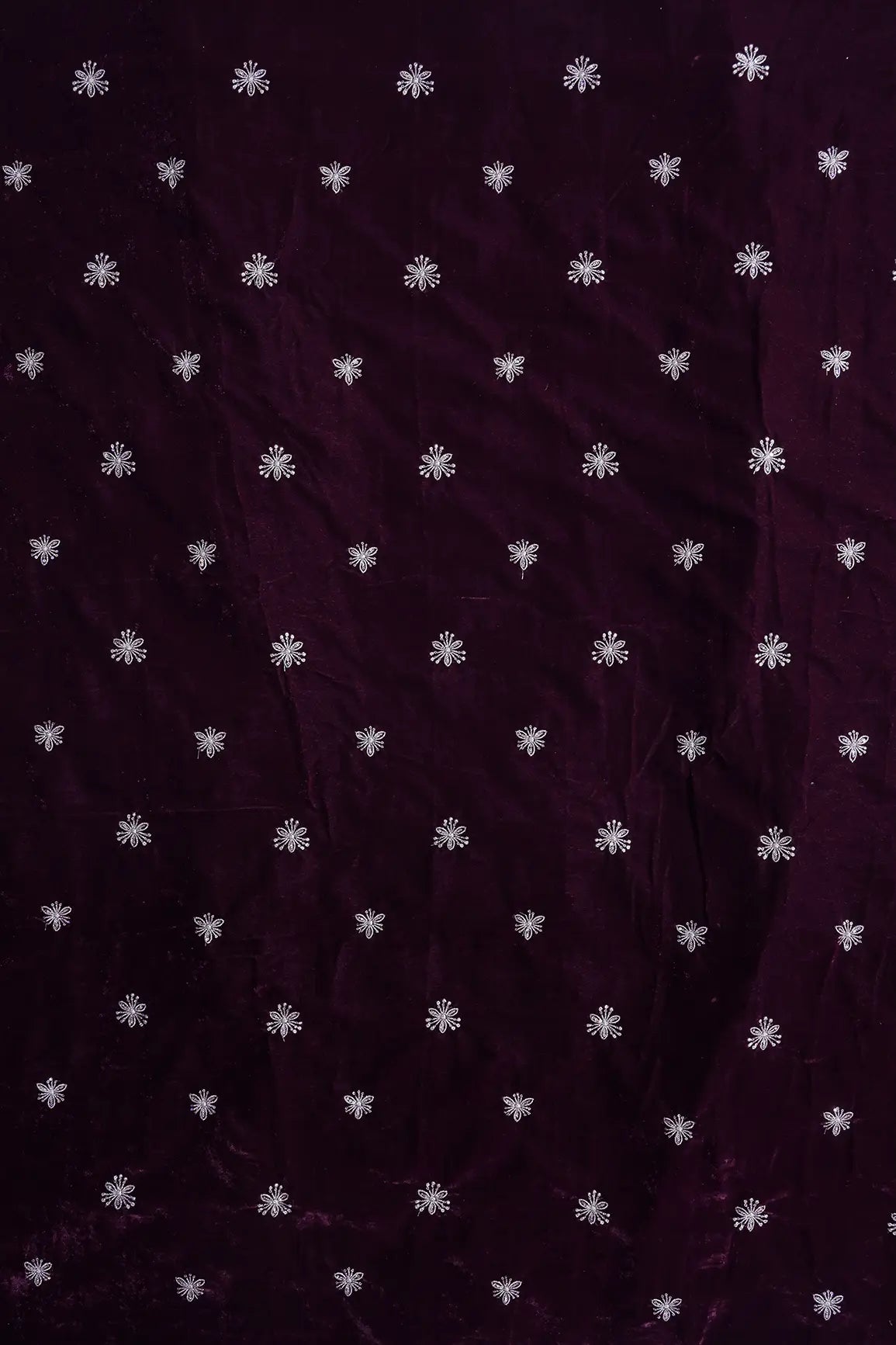 Gold Sequins With Gold Zari Small Floral Motif Embroidery Work On Wine Velvet Fabric
