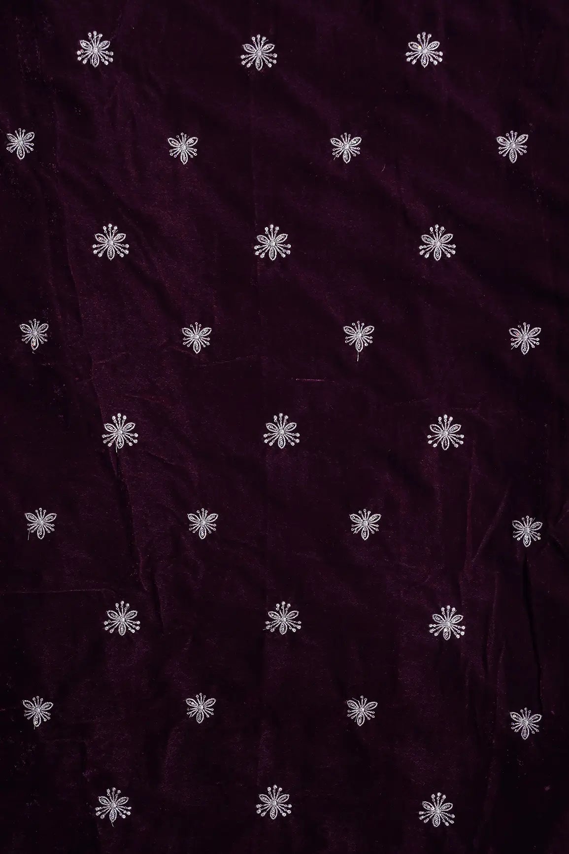 Gold Sequins With Gold Zari Small Floral Motif Embroidery Work On Wine Velvet Fabric