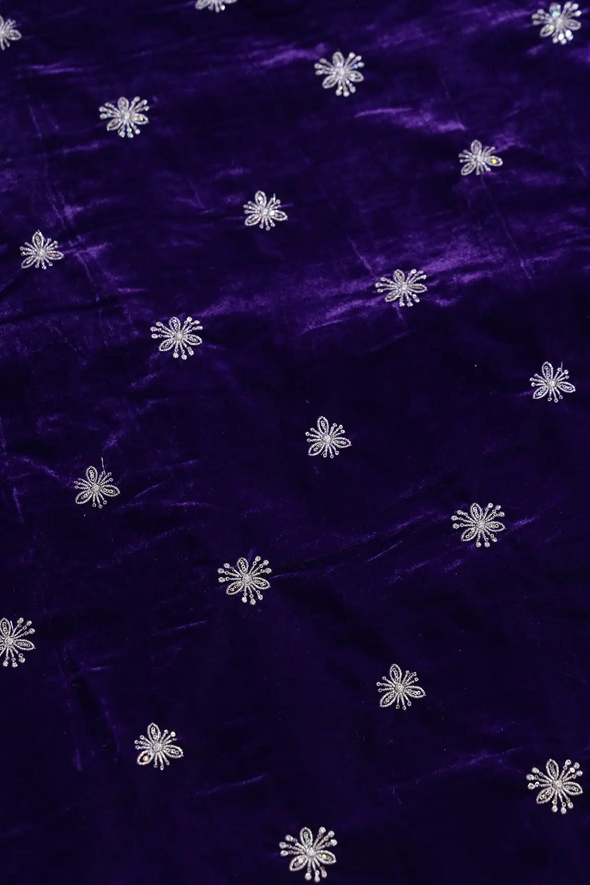 Gold Sequins With Gold Zari Small Floral Motif Embroidery Work On Purple Velvet Fabric