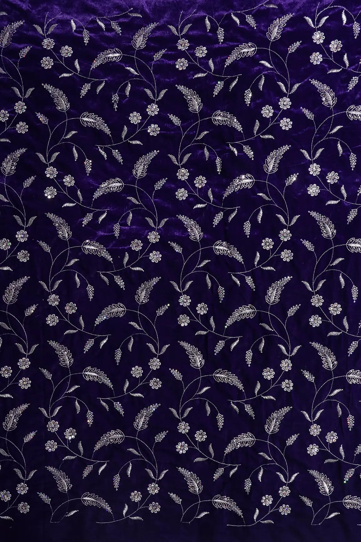 Gold Sequins With Gold Zari Floral Leafy Embroidery Work On Purple Velvet Fabric