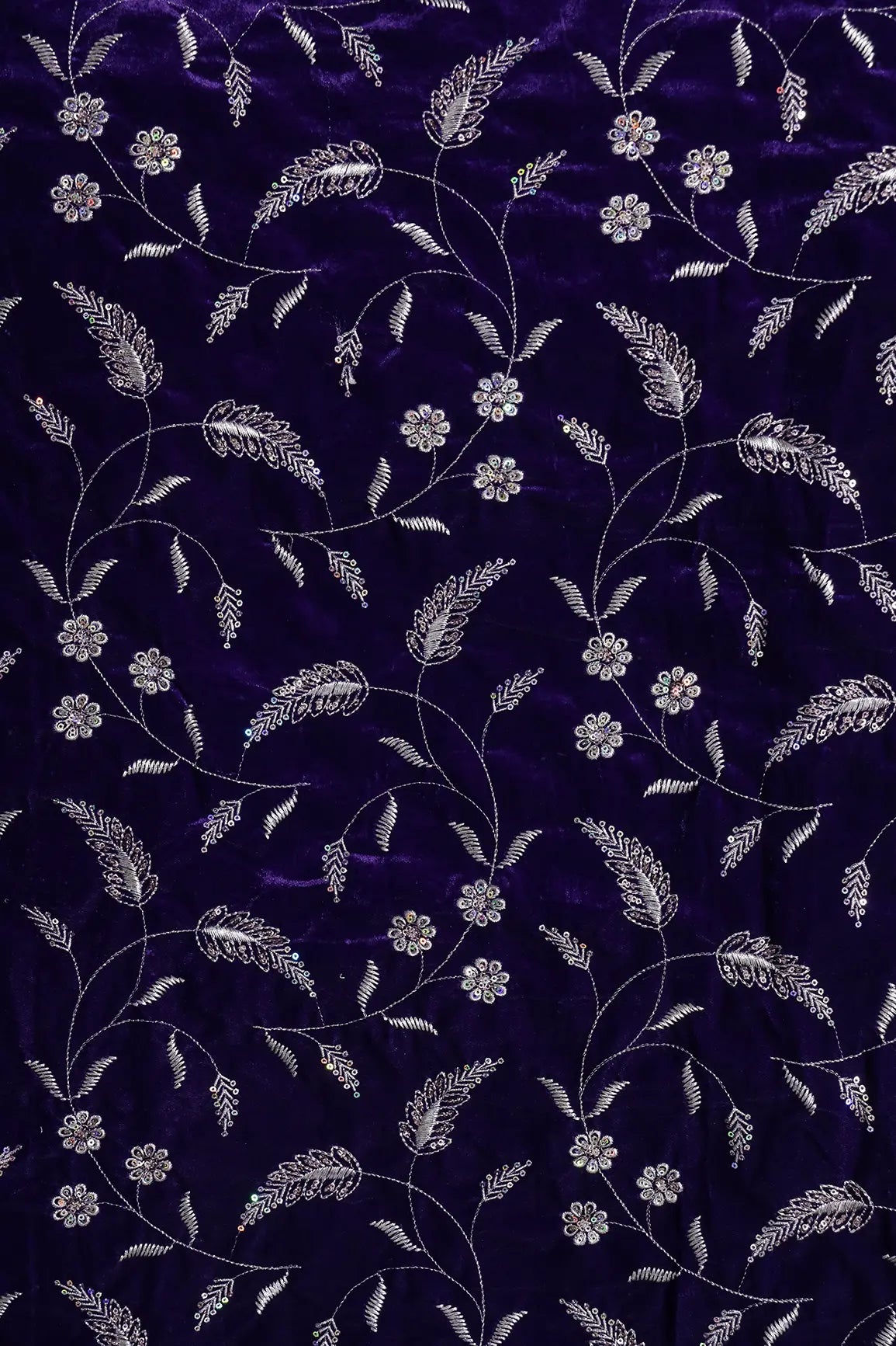 Gold Sequins With Gold Zari Floral Leafy Embroidery Work On Purple Velvet Fabric