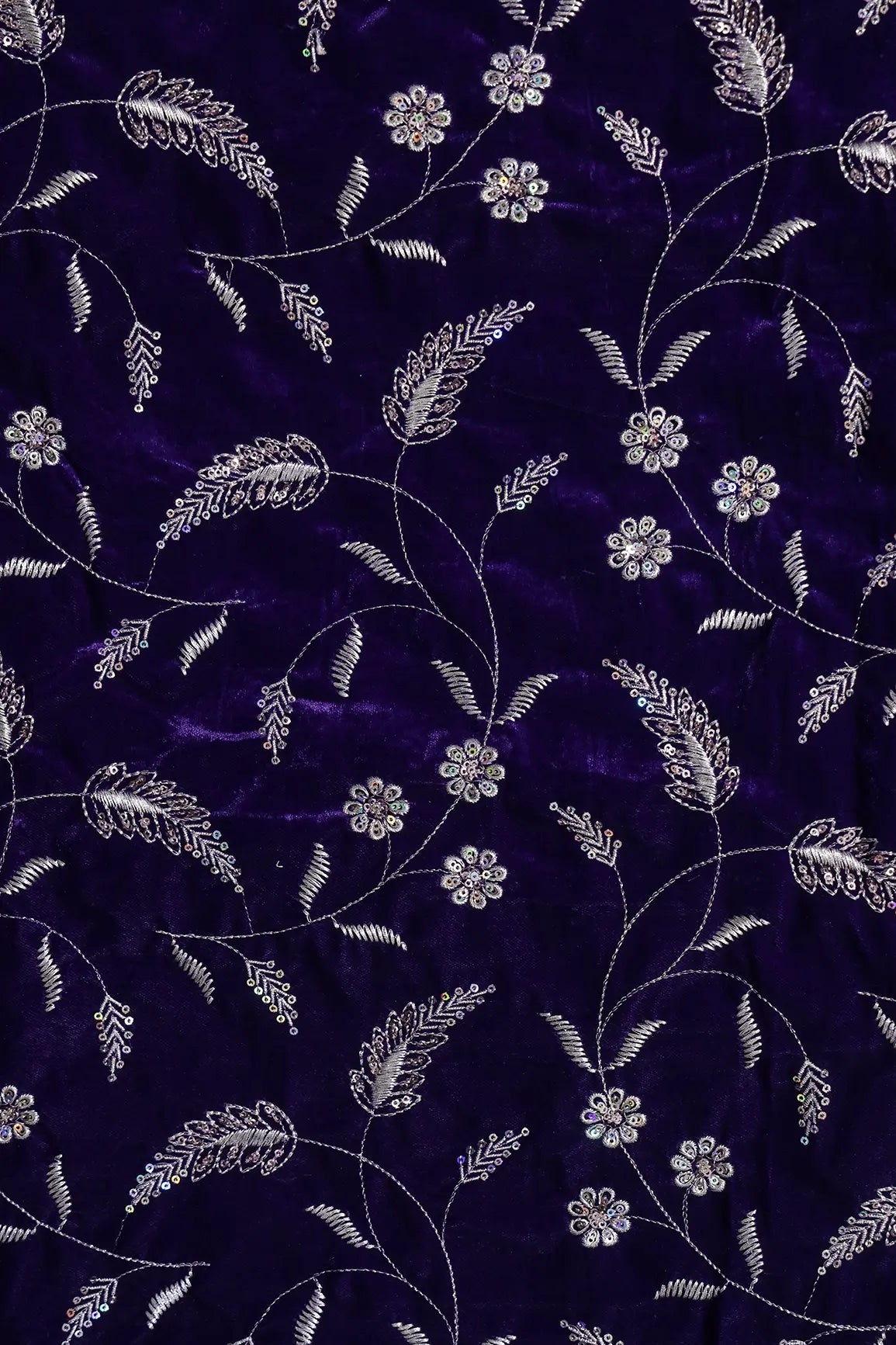 Gold Sequins With Gold Zari Floral Leafy Embroidery Work On Purple Velvet Fabric