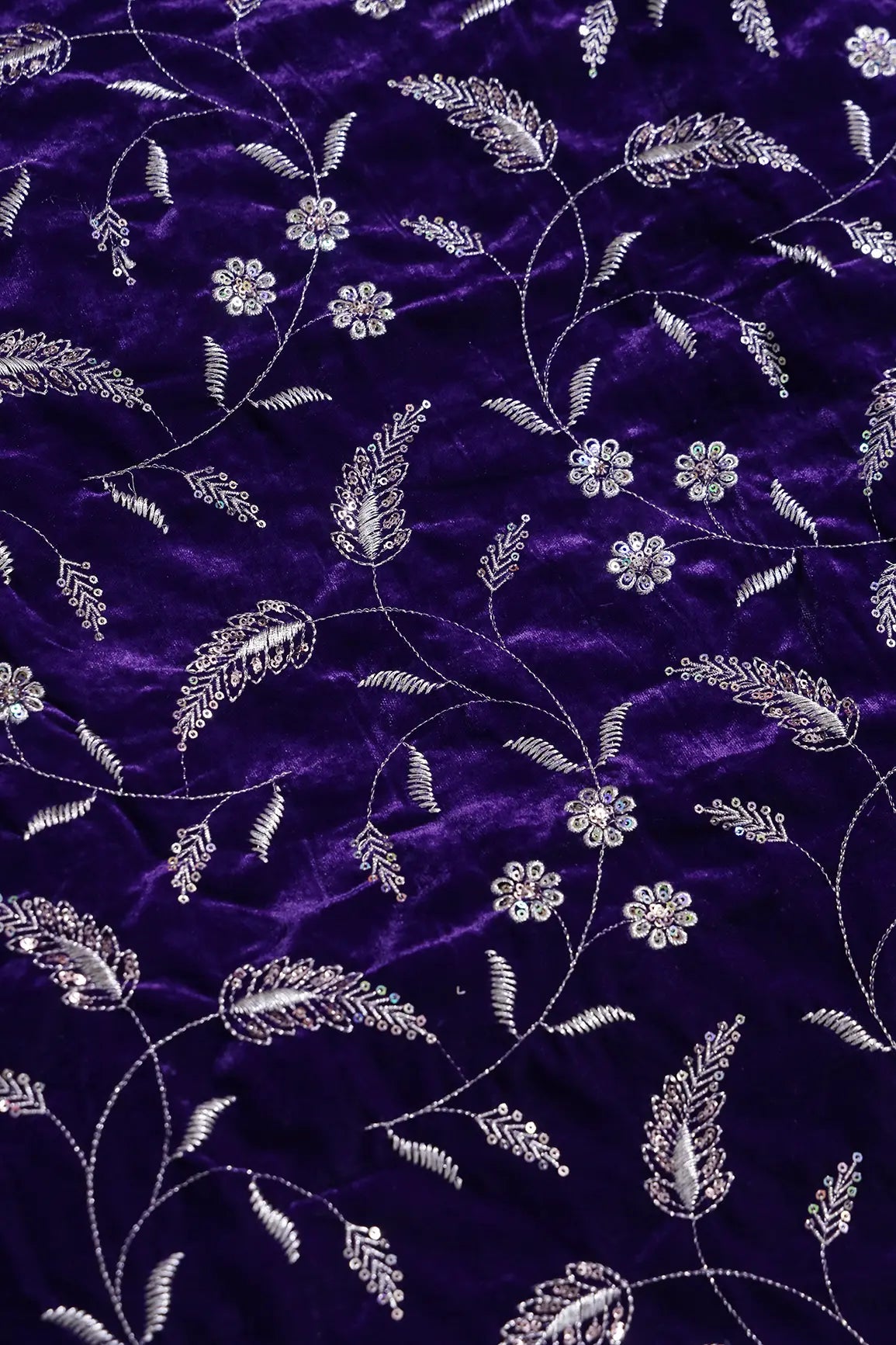 Gold Sequins With Gold Zari Floral Leafy Embroidery Work On Purple Velvet Fabric