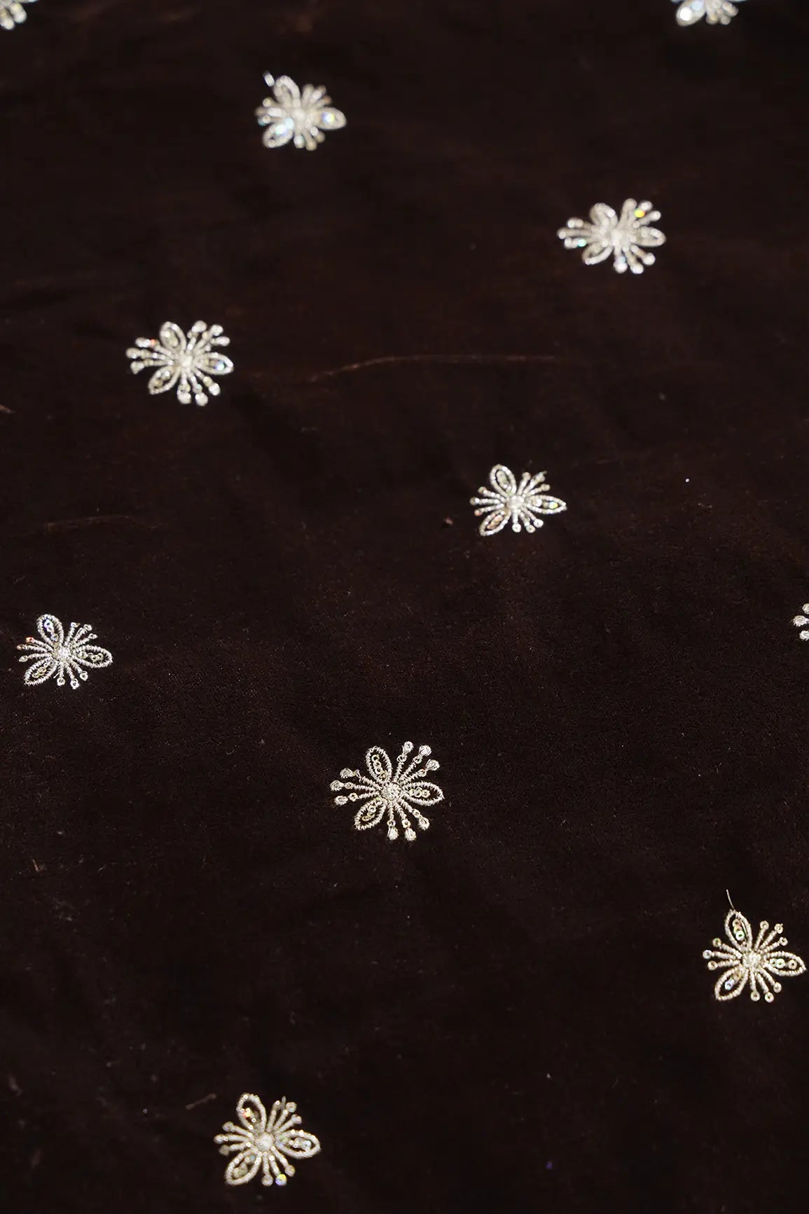 Gold Sequins With Gold Zari Small Floral Motif Embroidery Work On Coffee Velvet Fabric