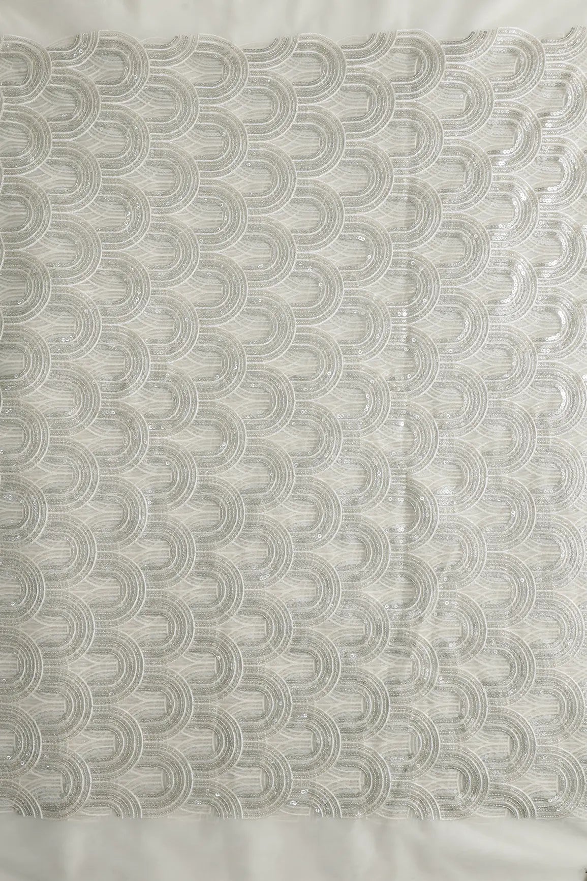 Off White Thread With Silver Sequins Abstract Embroidery Work On Off White Soft Net Fabric