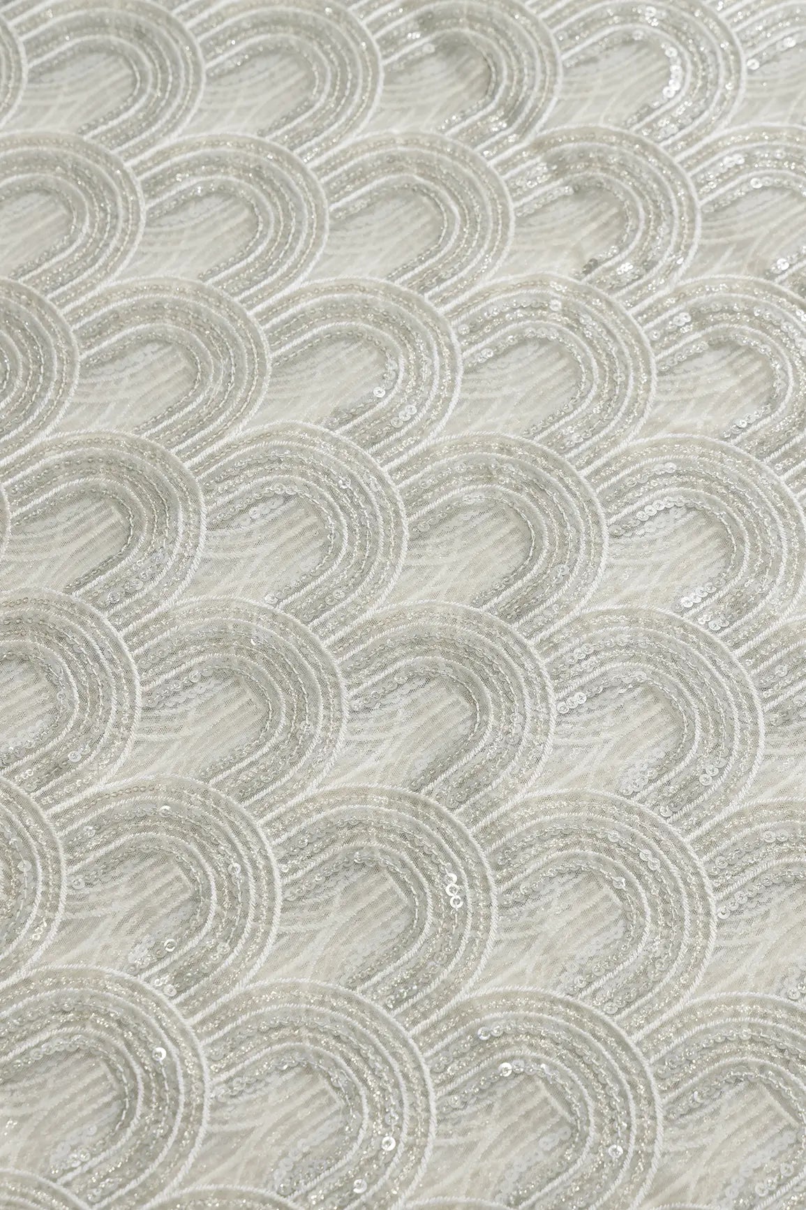 Off White Thread With Silver Sequins Abstract Embroidery Work On Off White Soft Net Fabric