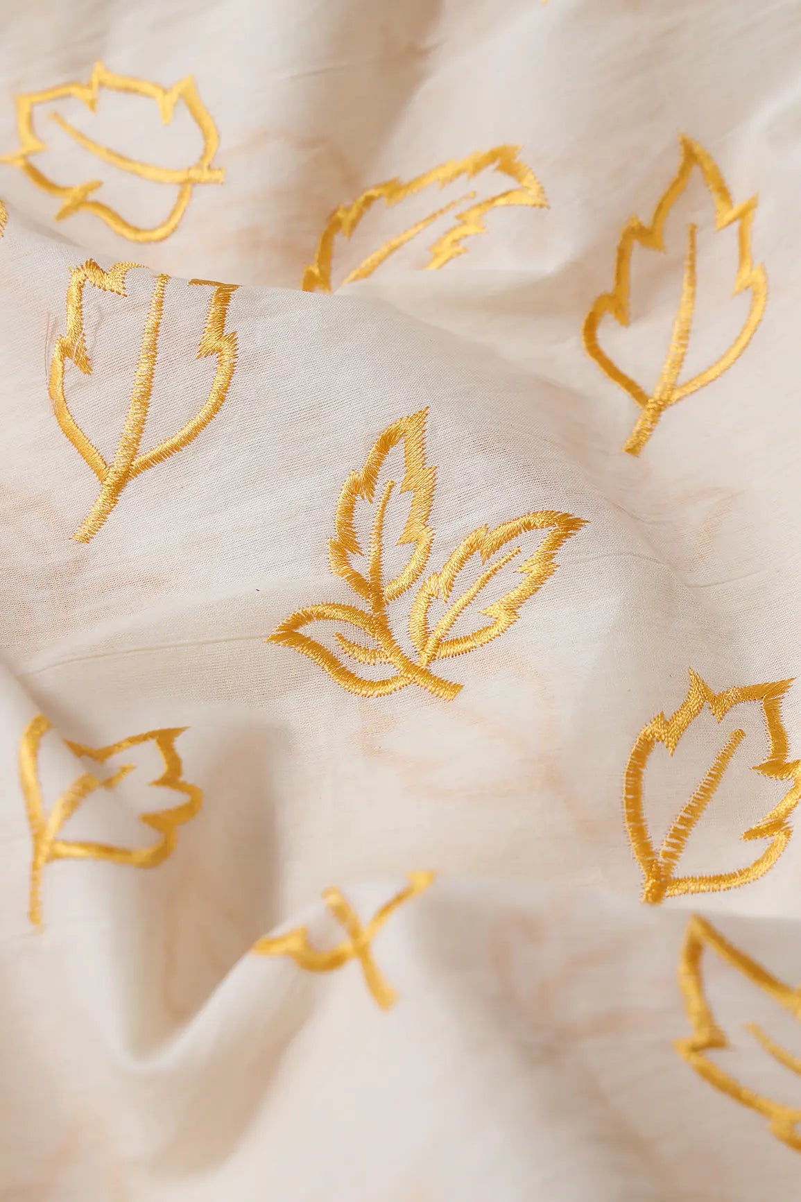 Beautiful Mustard Leafy Embroidery On Off White Organic Cotton Fabric