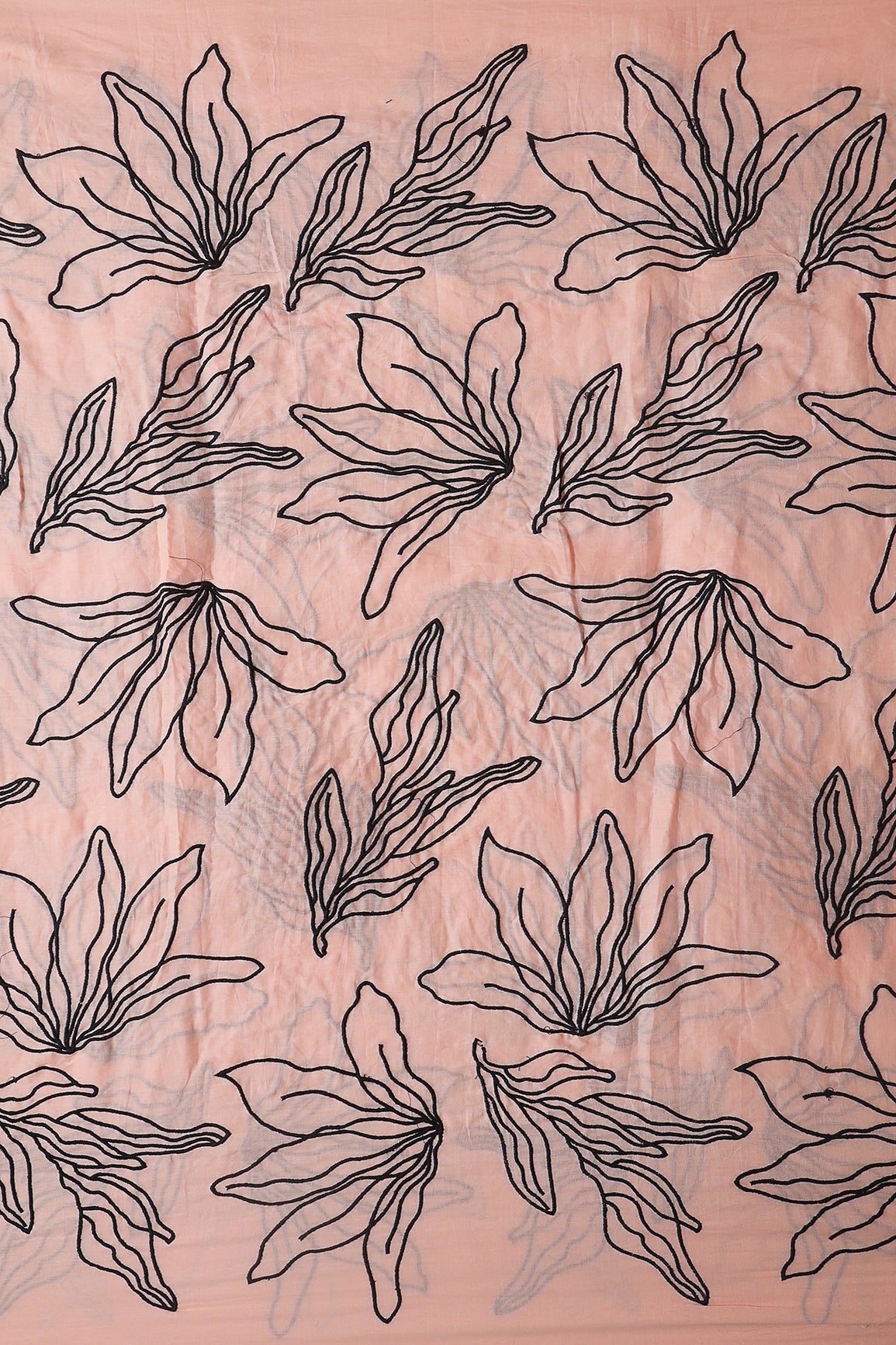 Beautiful Black Floral Embroidery On Peach Pure Mul Cotton Fabric