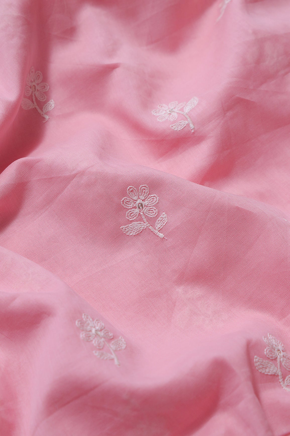 White Thread Small Floral Embroidery On Pink Pure Mul Cotton Fabric