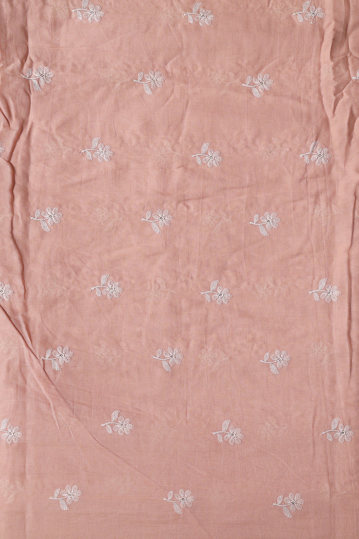 White Thread Small Floral Embroidery On Peach Pure Mul Cotton Fabric