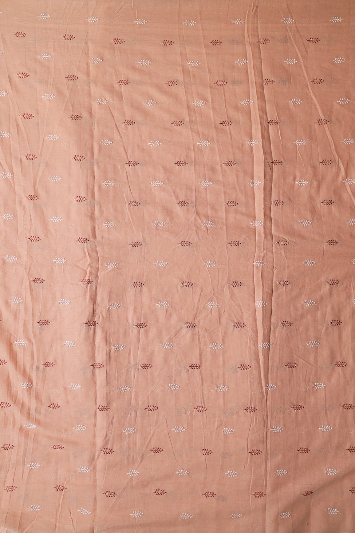Peach And White Thread Leafy Embroidery On Peach Pure Mul Cotton Fabric