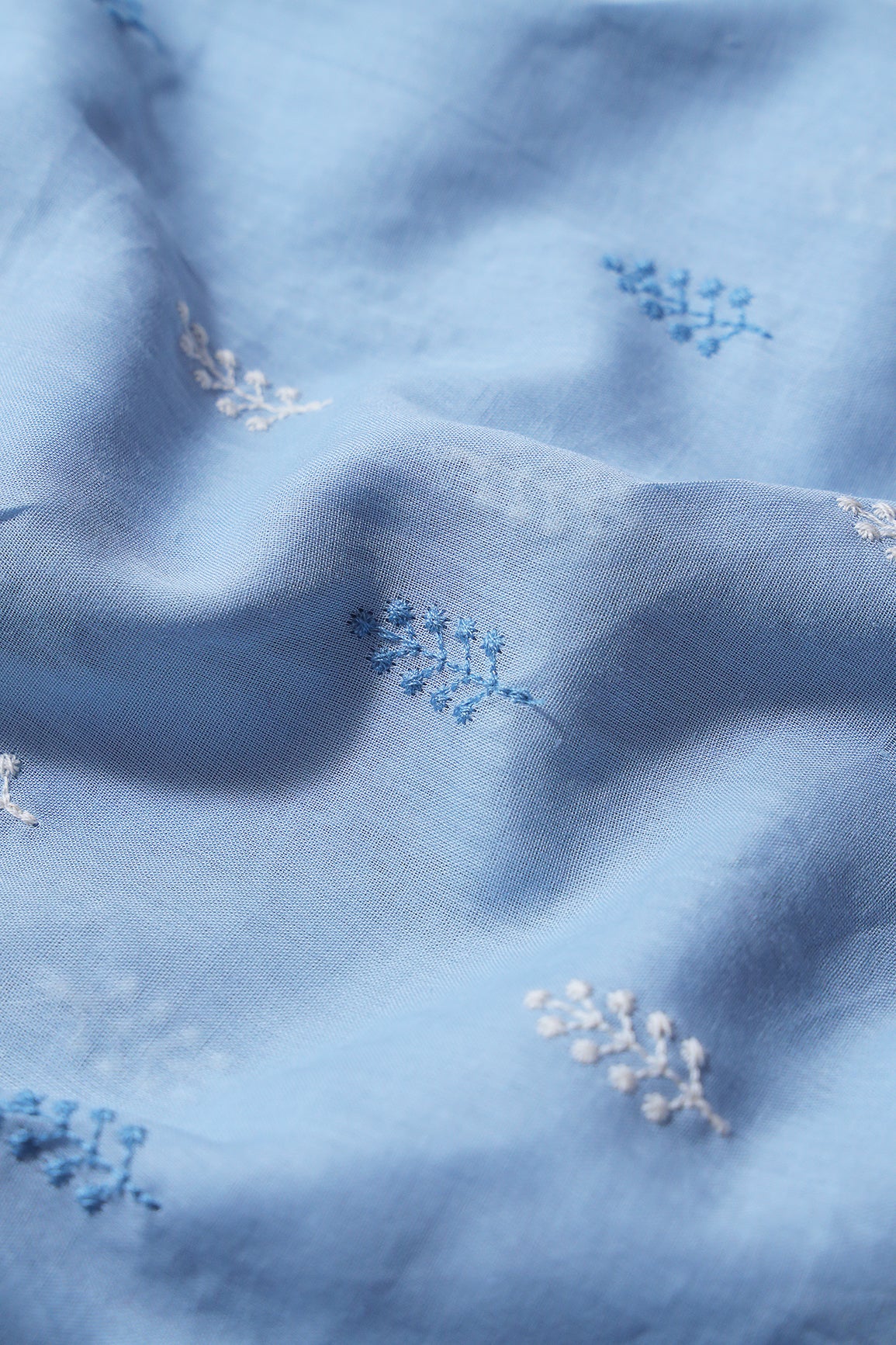 Blue And White Thread Leafy Embroidery On Pastel Blue Pure Mul Cotton Fabric