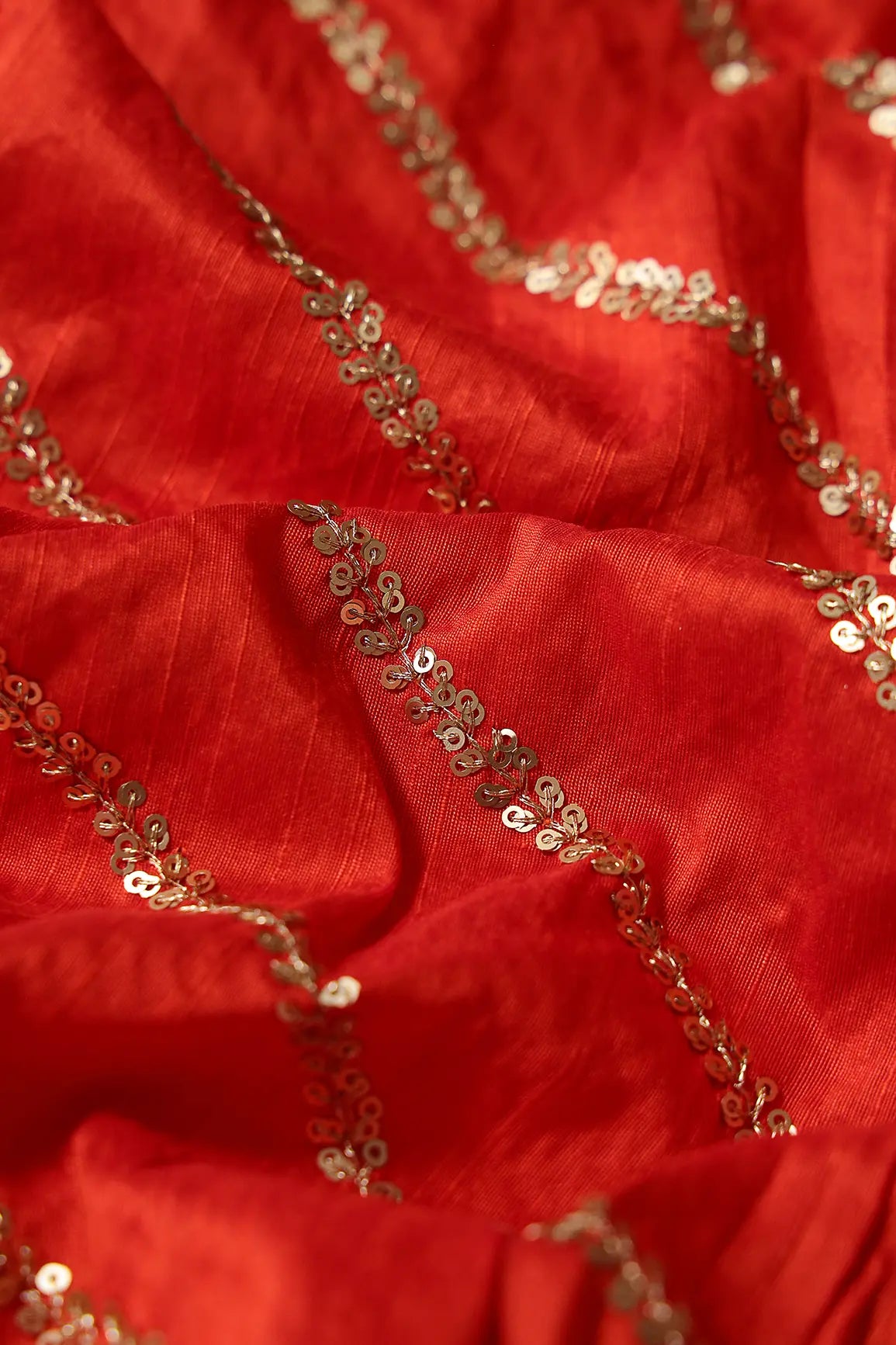 Gold Sequins With Gold Zari Stripes Embroidery Work On Dark Orange Raw Silk Fabric