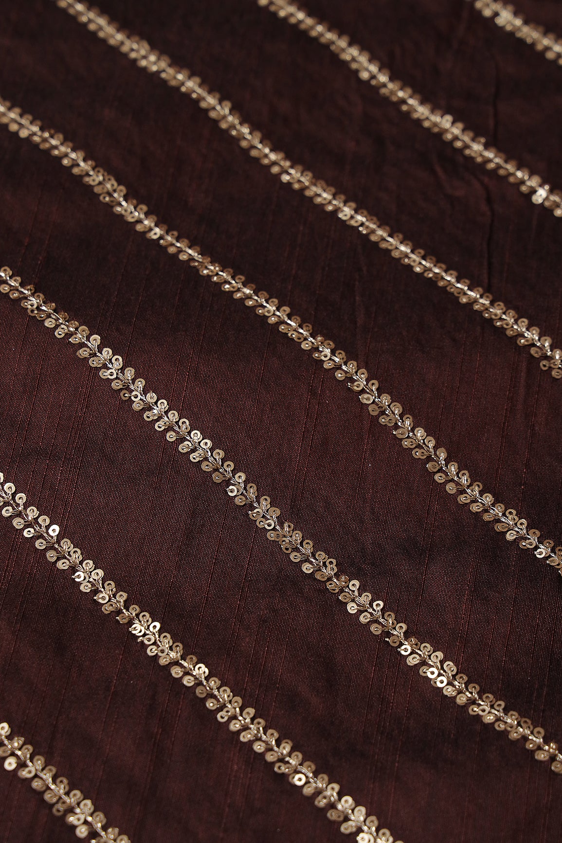 Gold Sequins With Gold Zari Stripes Embroidery Work On Brown Raw Silk Fabric