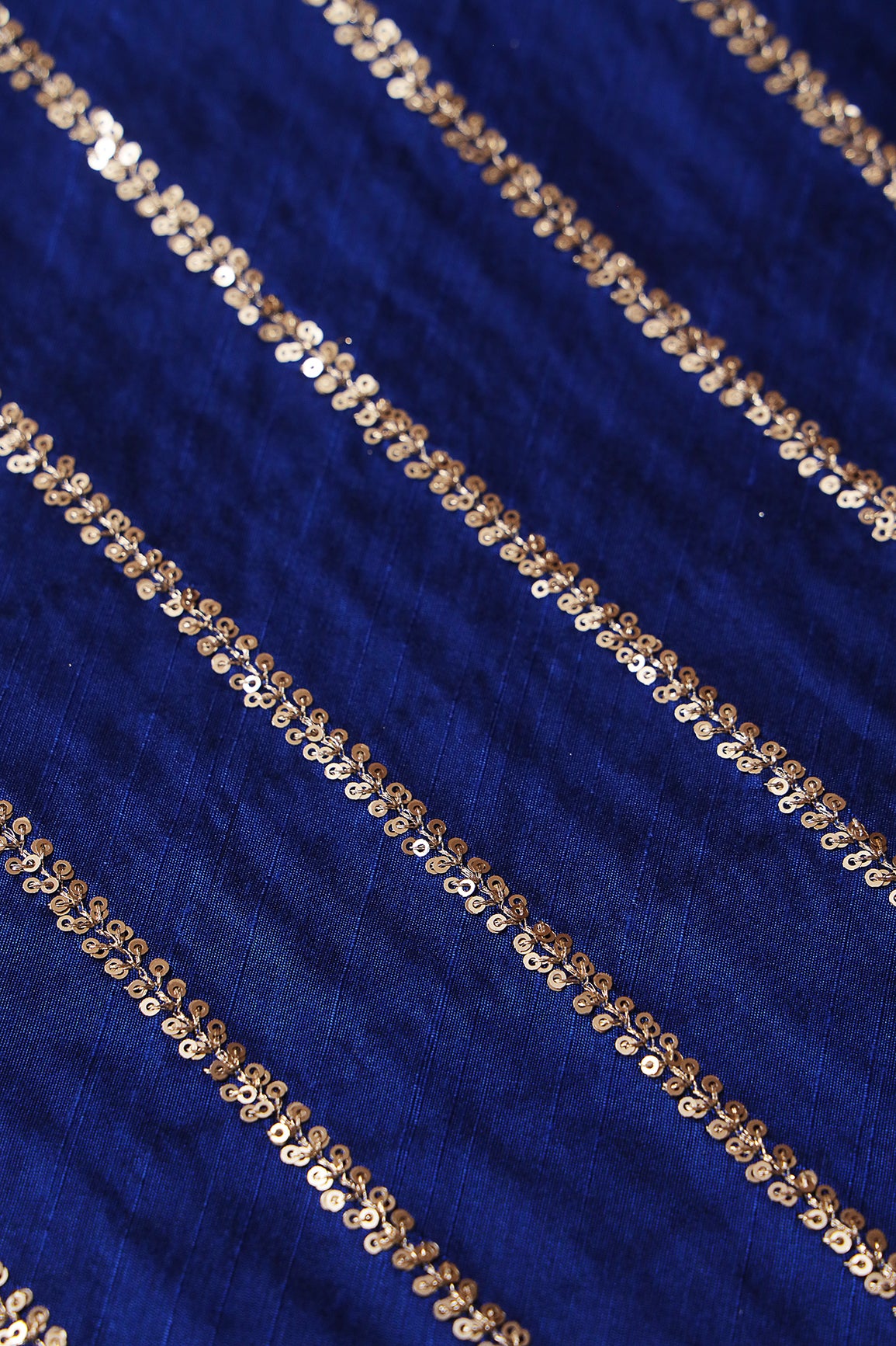 Gold Sequins With Gold Zari Stripes Embroidery Work On Royal Blue Raw Silk Fabric