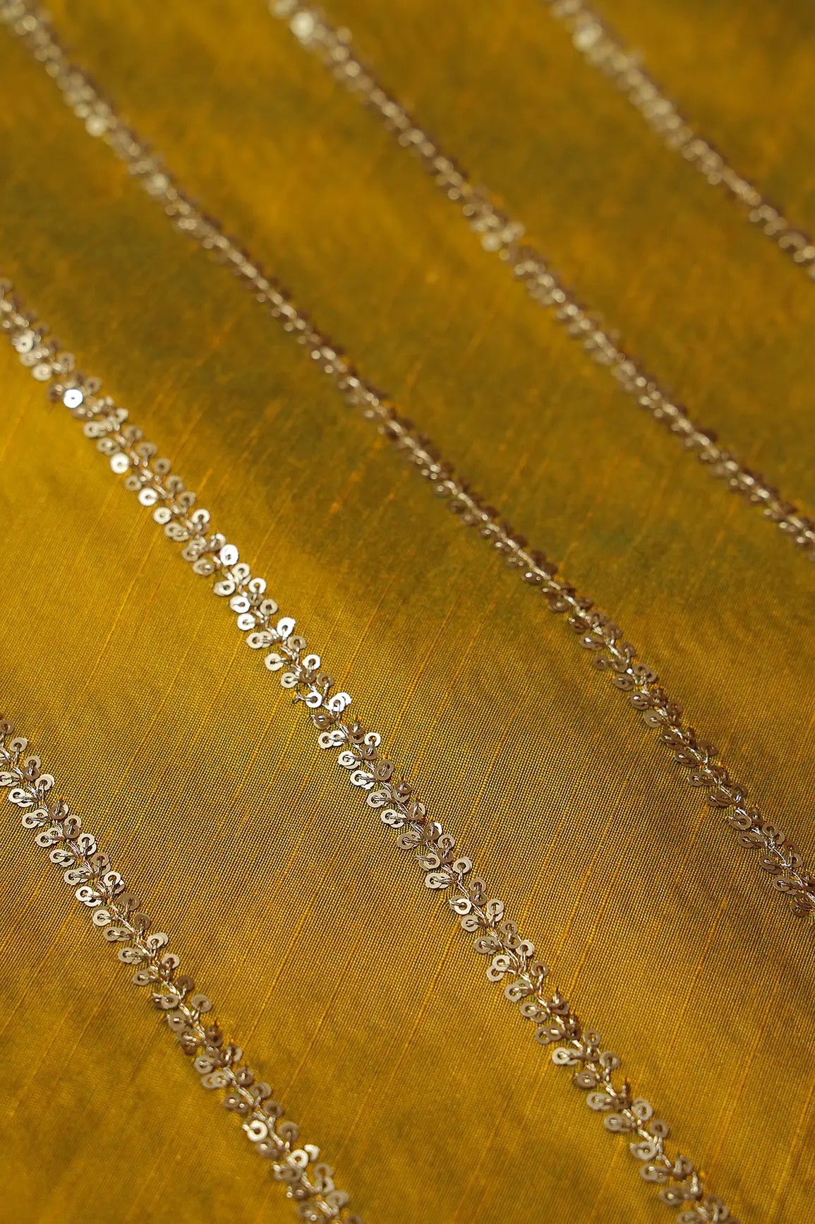 Gold Sequins With Gold Zari Stripes Embroidery Work On Dark Mustard Raw Silk Fabric