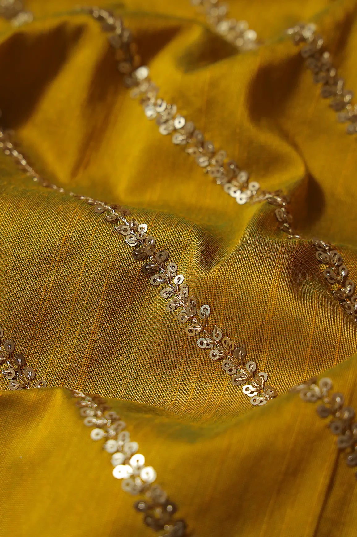 Gold Sequins With Gold Zari Stripes Embroidery Work On Dark Mustard Raw Silk Fabric