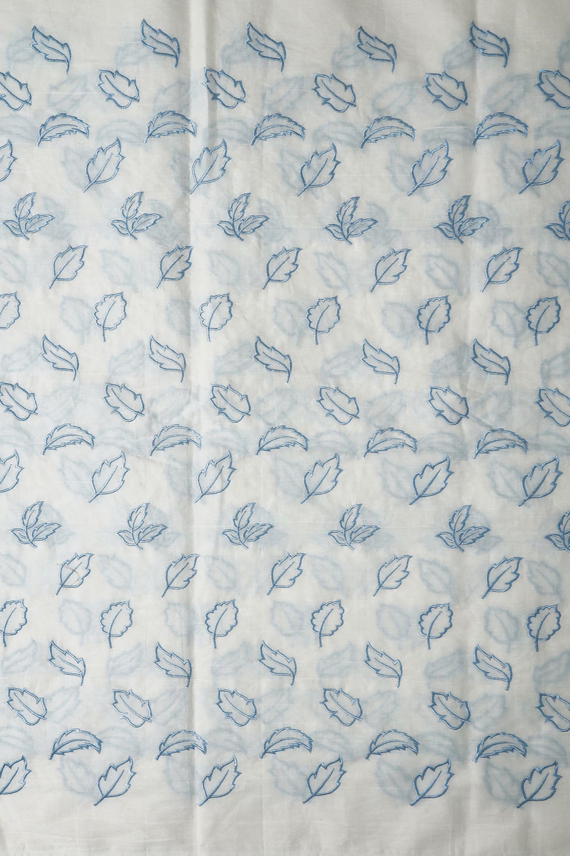 Beautiful Blue Leafy Embroidery On Off White Organic Cotton Fabric