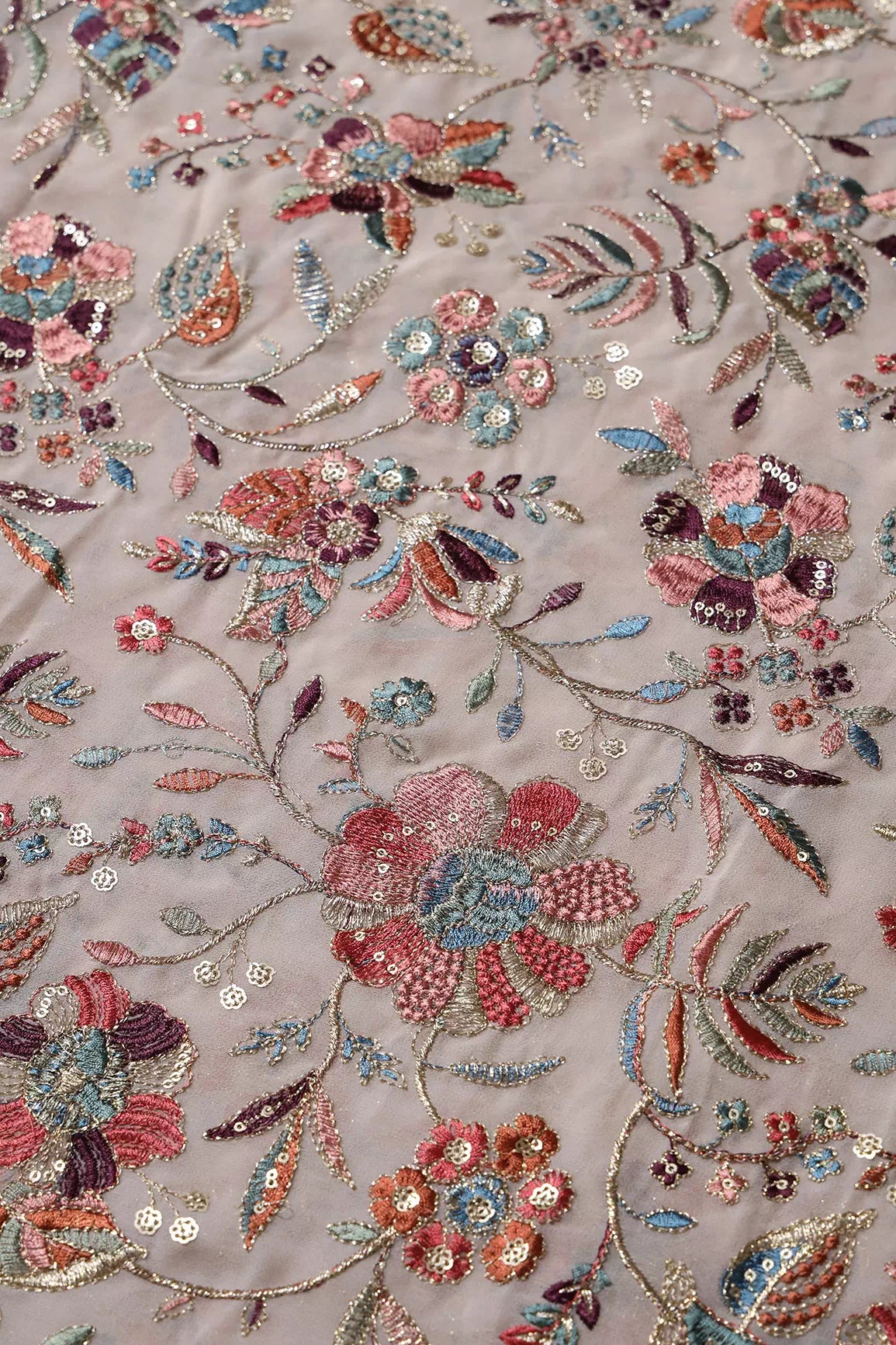 Exclusive Floral Heavy Embroidery With Gold Sequins On Light Peach Georgette Fabric