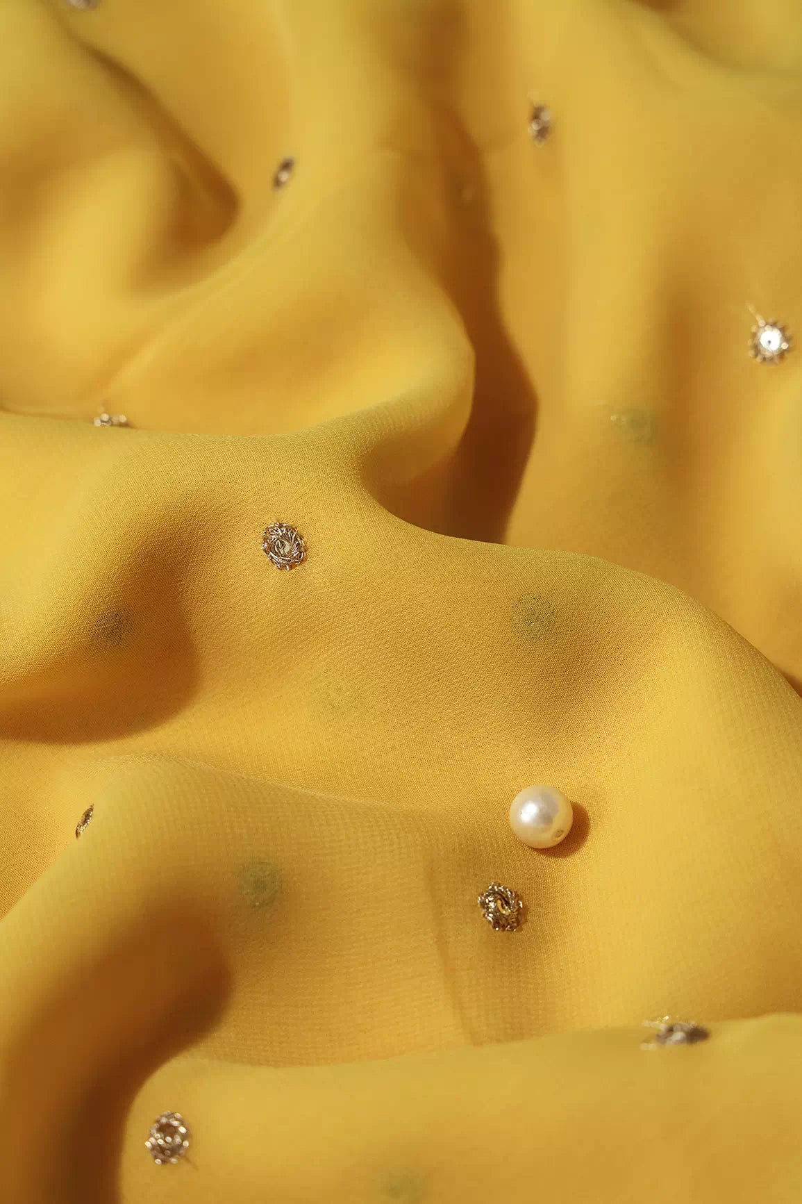 Gold Sequins With Gold Zari Small Motif Embroidery Work On Yellow Georgette Fabric