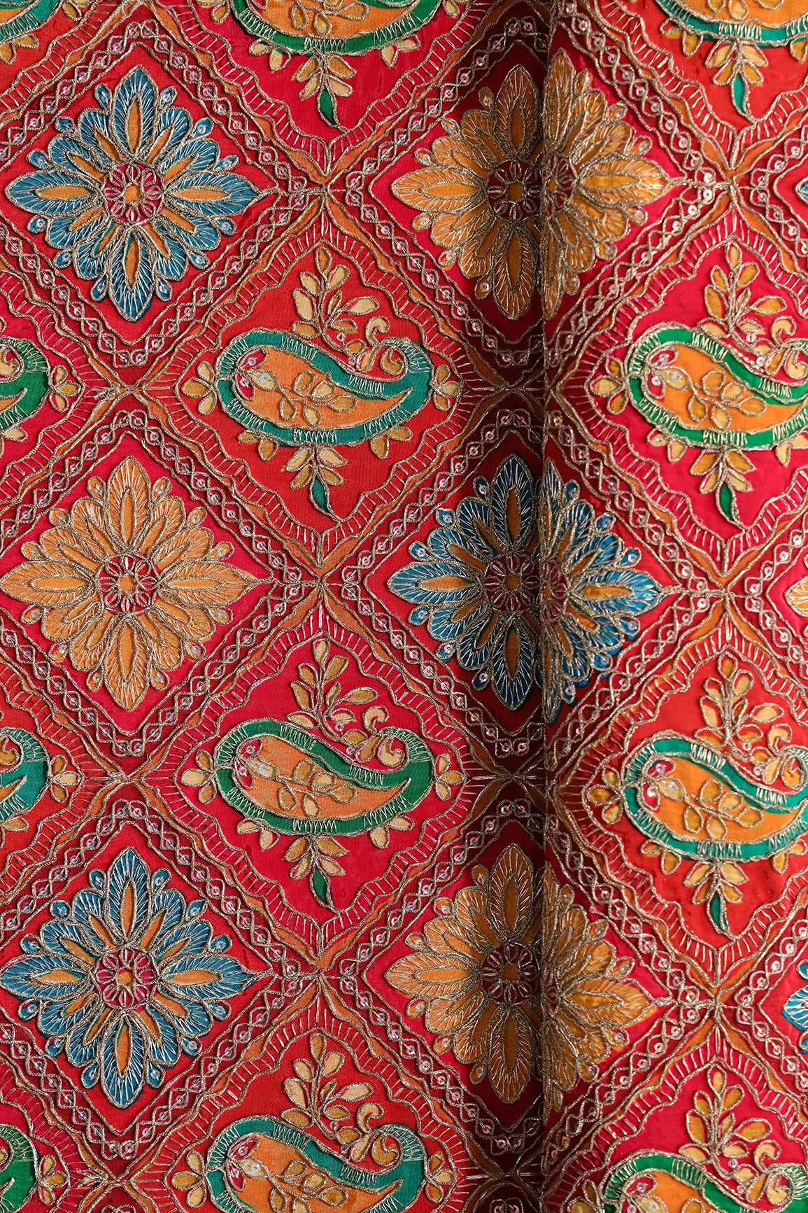 Positional Print With Sequins And Traditional Embroidery On Red And Rani Crepe Fabric