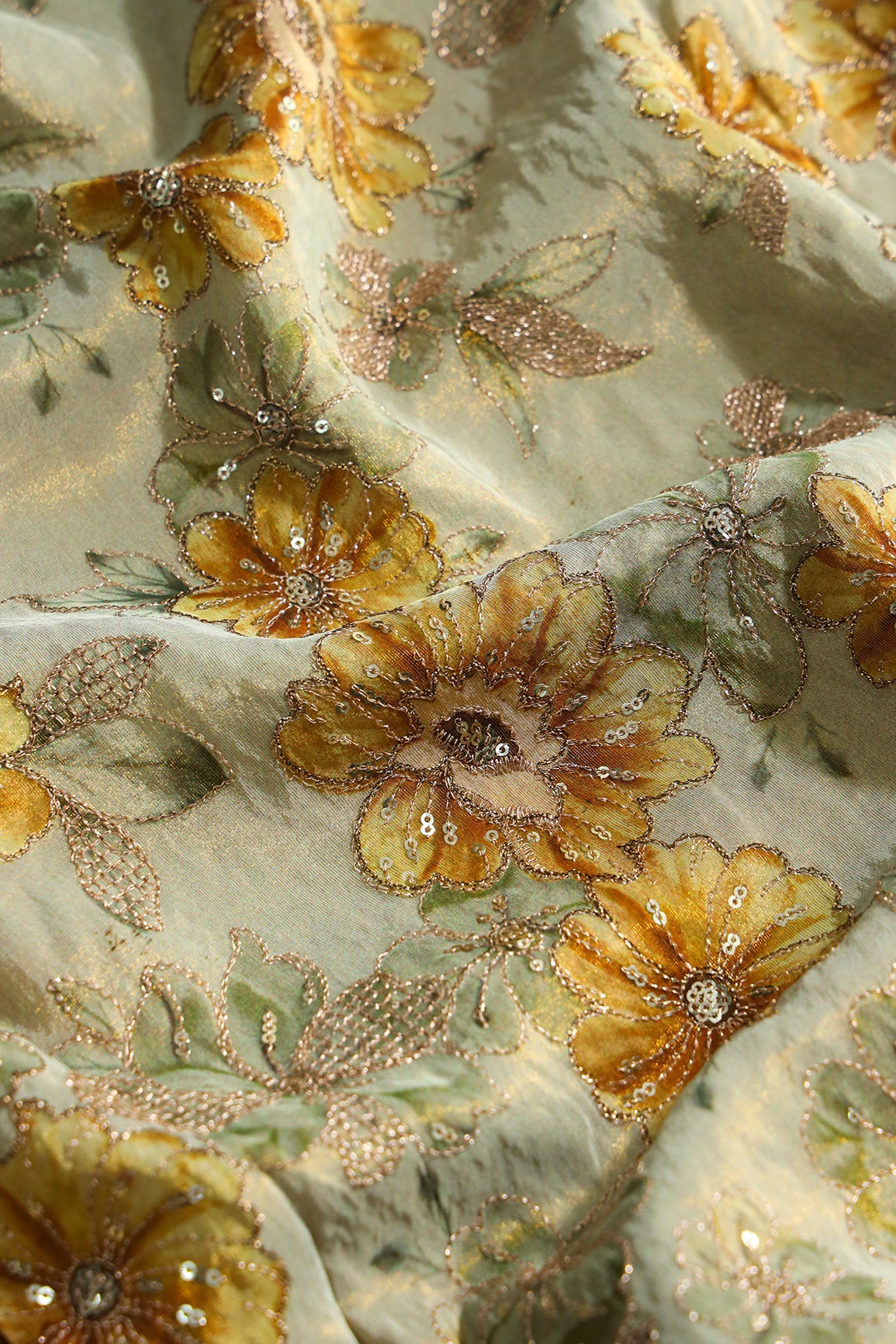 Floral Position Print On Gold Zari With Sequins Embroidery On Olive Viscose Zari Tissue Fabric