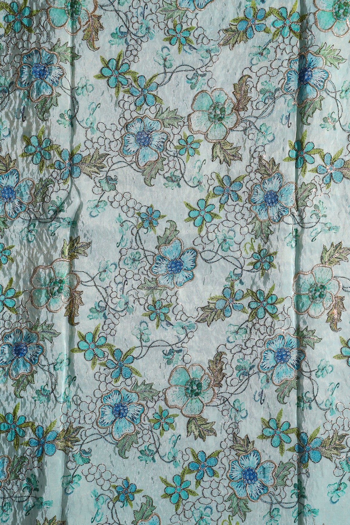 Floral Position Print On Sequins With Zari Embroidery On Pastel Blue Viscose Zari Tissue Fabric