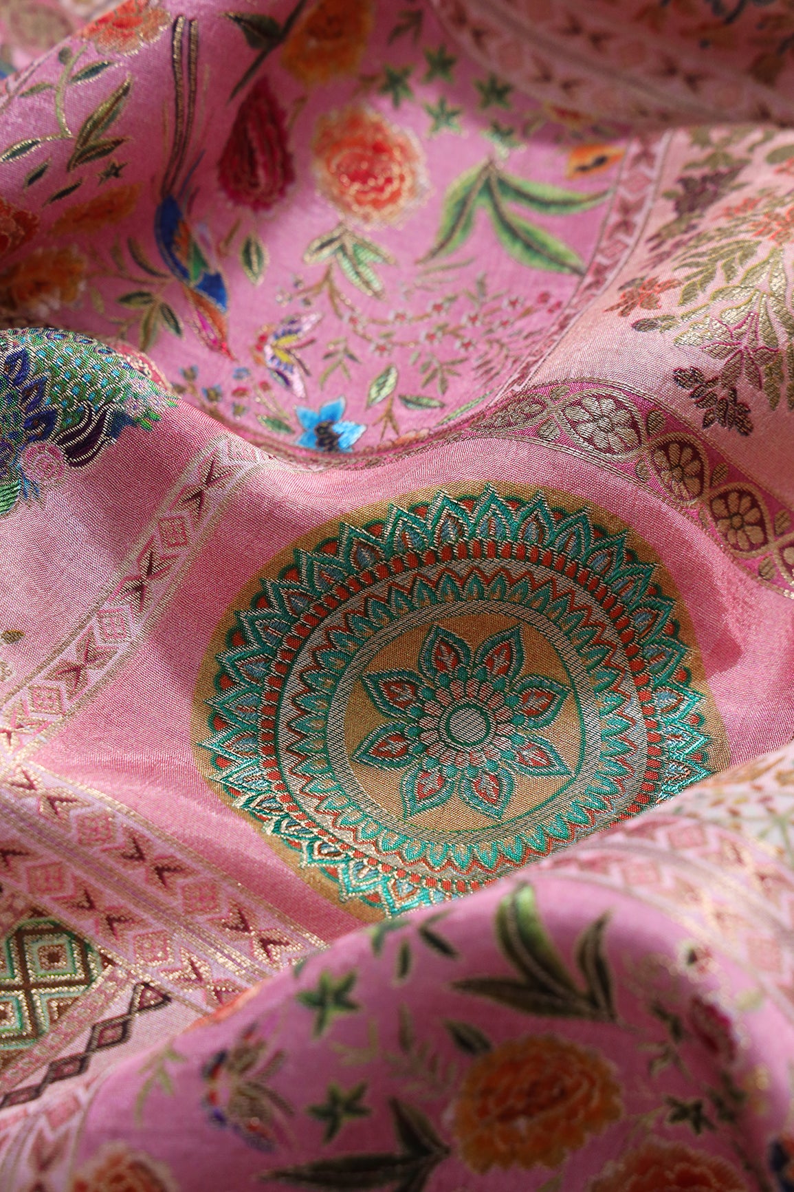 Positional Floral Print On Pastel Pink Viscose Dola Silk Jacquard Fabric