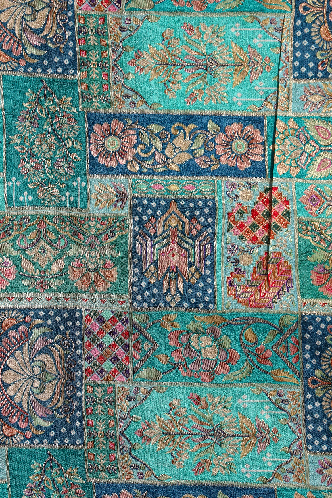 Positional Floral Print On Teal Viscose Dola Silk Jacquard Fabric