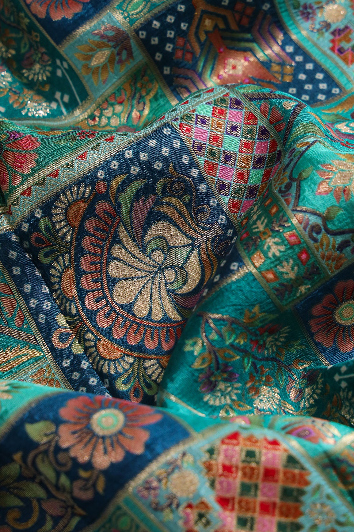 Positional Floral Print On Teal Viscose Dola Silk Jacquard Fabric