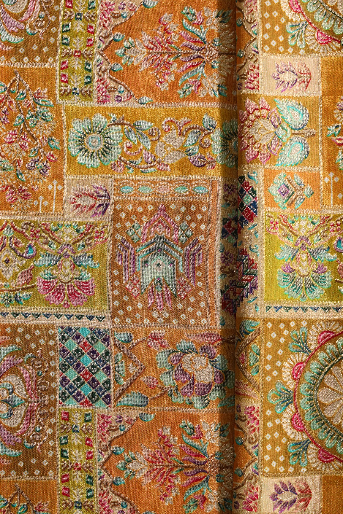 Positional Floral Print On Mustard Yellow Viscose Dola Silk Jacquard Fabric