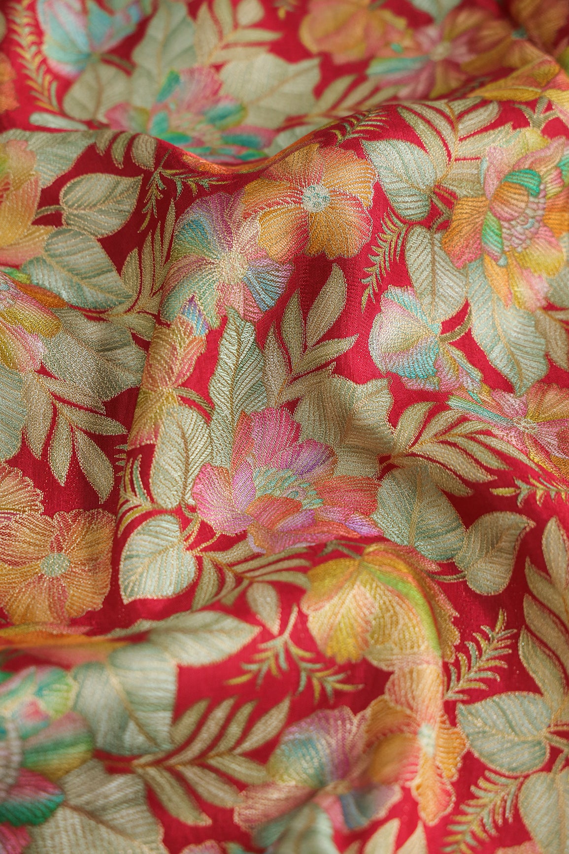Positional Floral Print On Red Viscose Dola Silk Jacquard Fabric