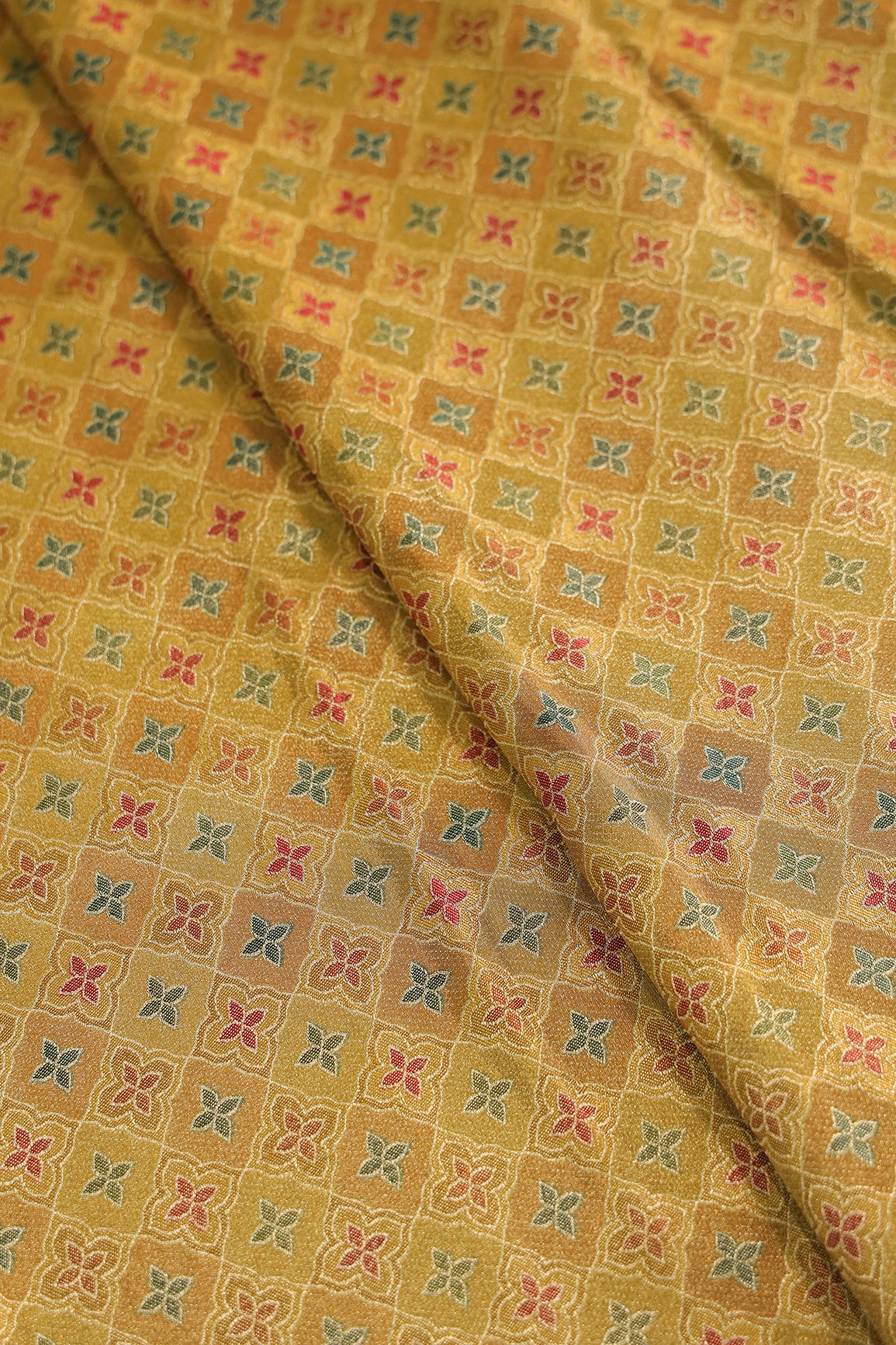 Positional Print On Golden Lemon Viscose kanjivaram Silk Jacquard Fabric