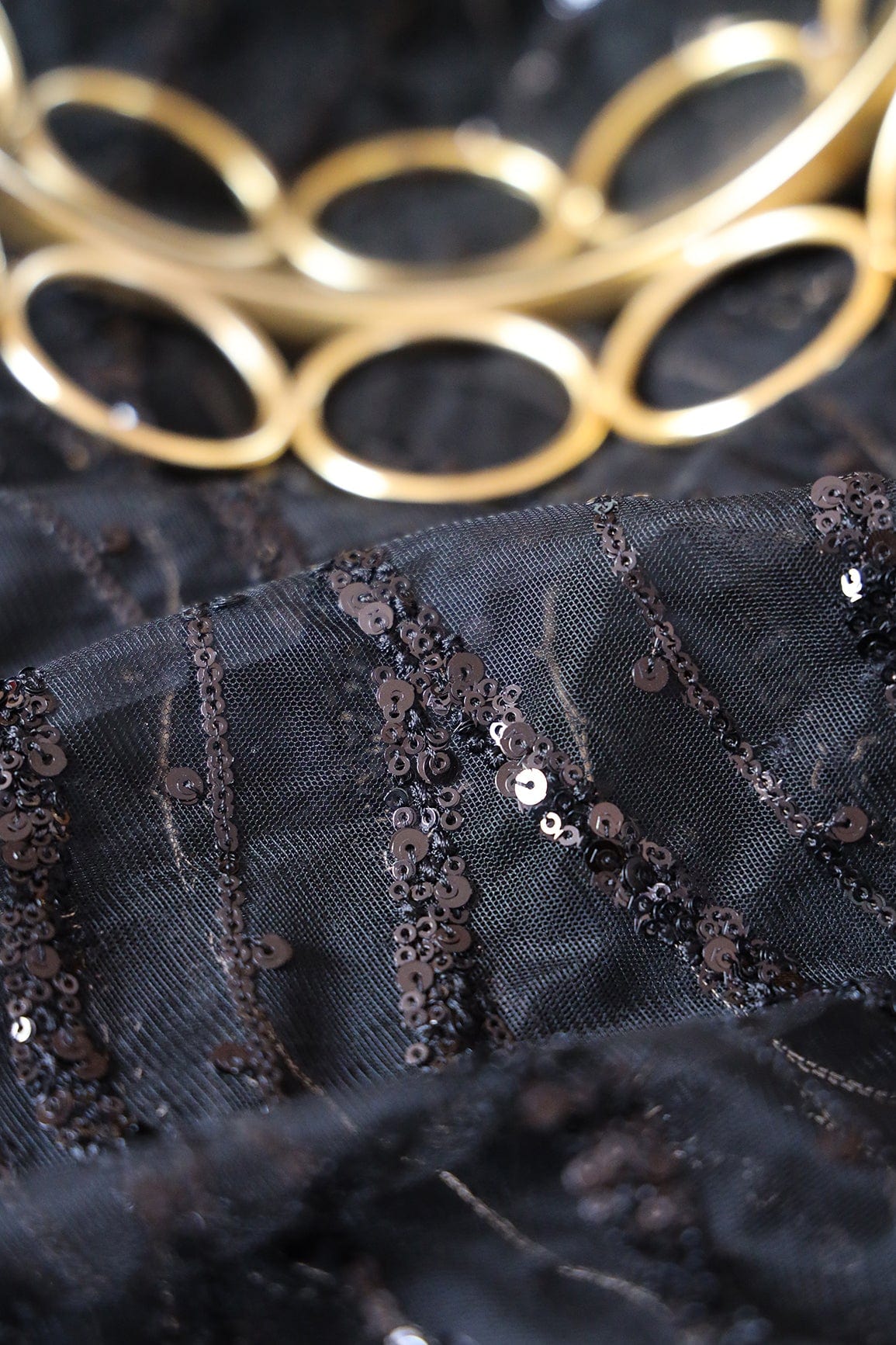 Beautiful Sequins With Black Thread Wavy Embroidery Work On Black Soft Net Fabric - doeraa