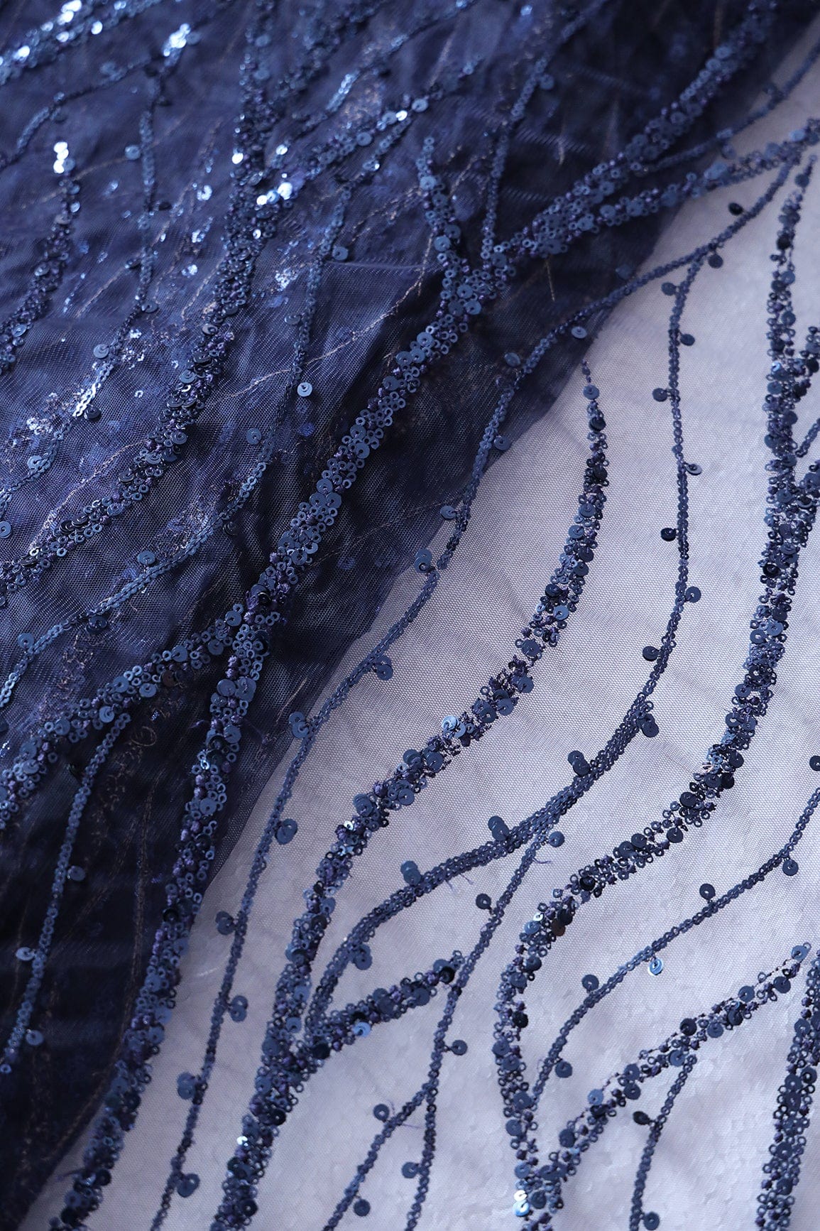 Beautiful Sequins With Blue Thread Wavy Embroidery Work On Navy Blue Soft Net Fabric - doeraa