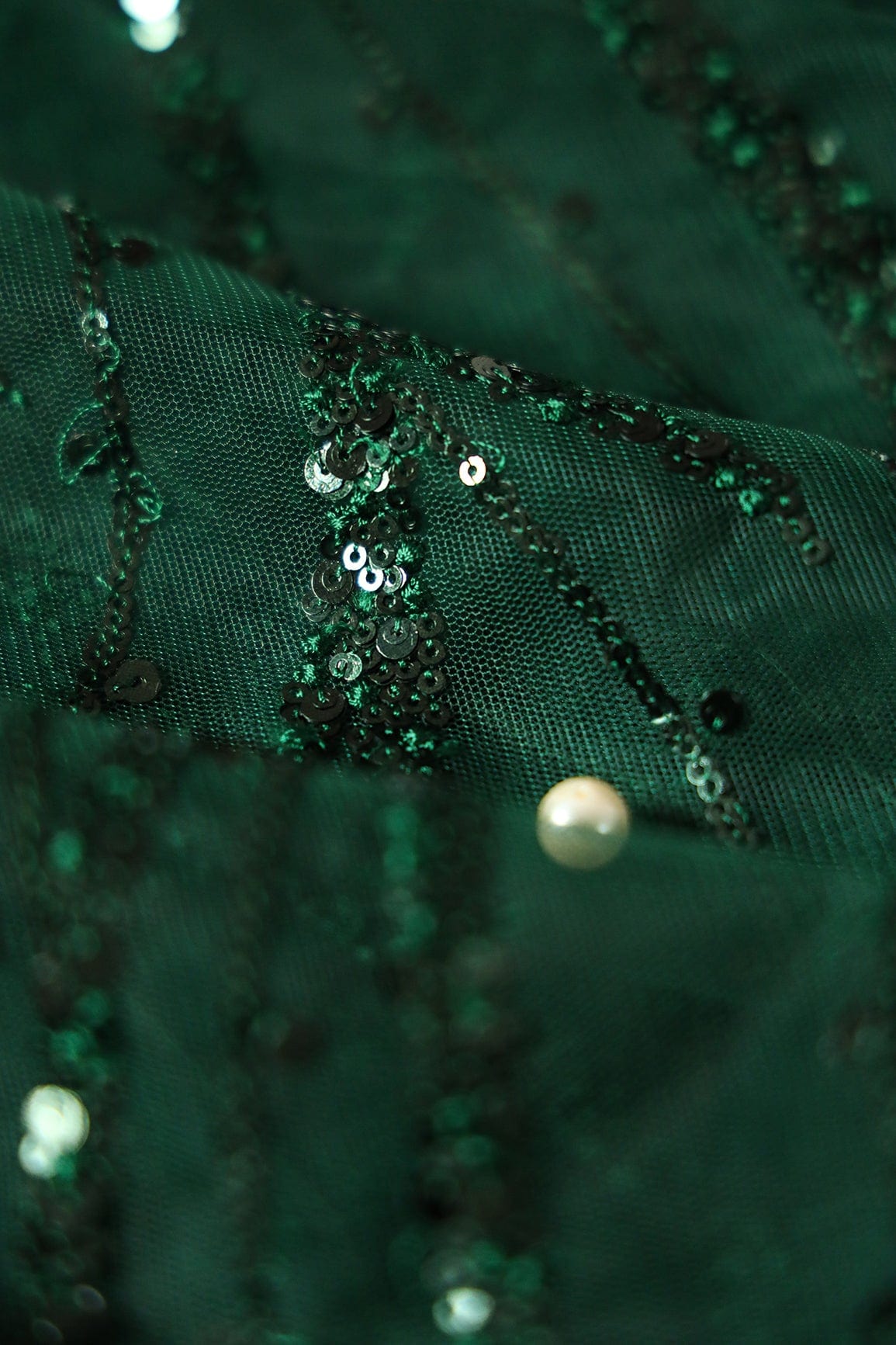 Beautiful Sequins With Green Thread Wavy Embroidery Work On Bottle Green Soft Net Fabric - doeraa