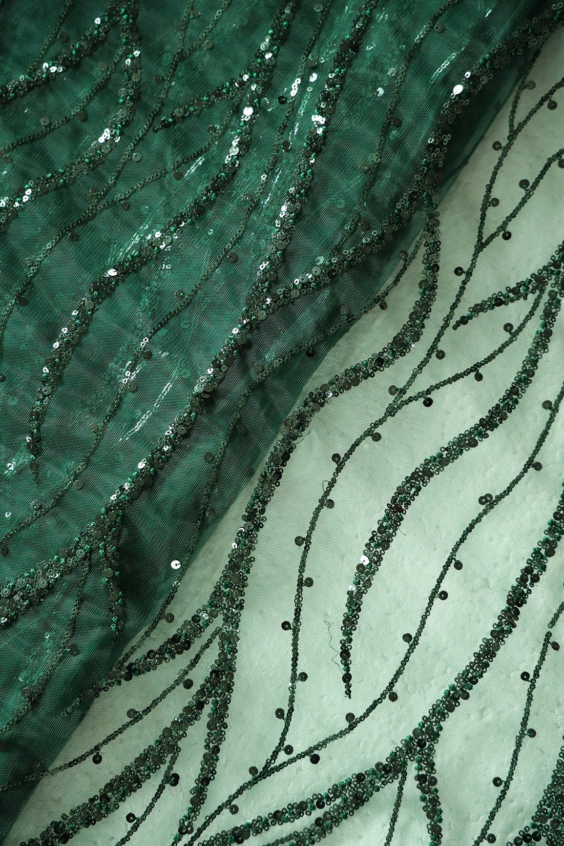 Beautiful Sequins With Green Thread Wavy Embroidery Work On Bottle Green Soft Net Fabric - doeraa