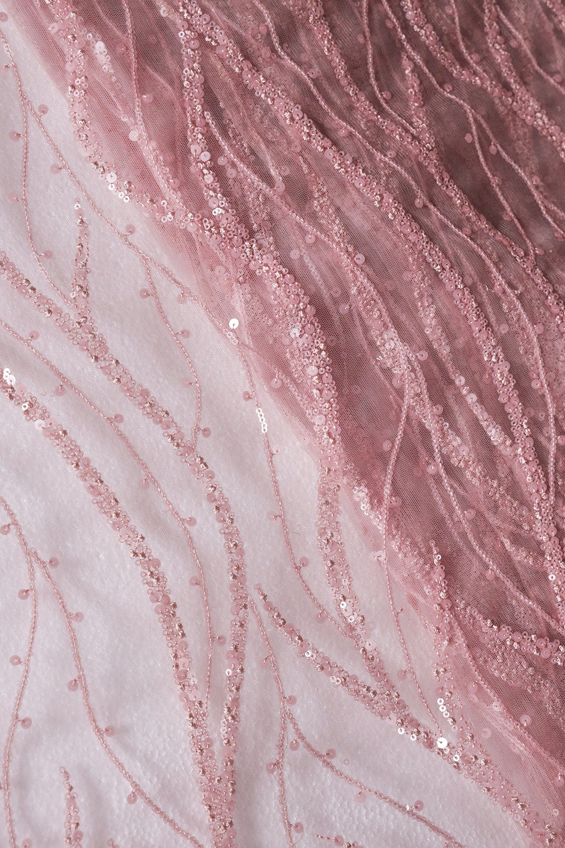 Beautiful Sequins With Mauve Thread Wavy Embroidery Work On Mauve Soft Net Fabric - doeraa