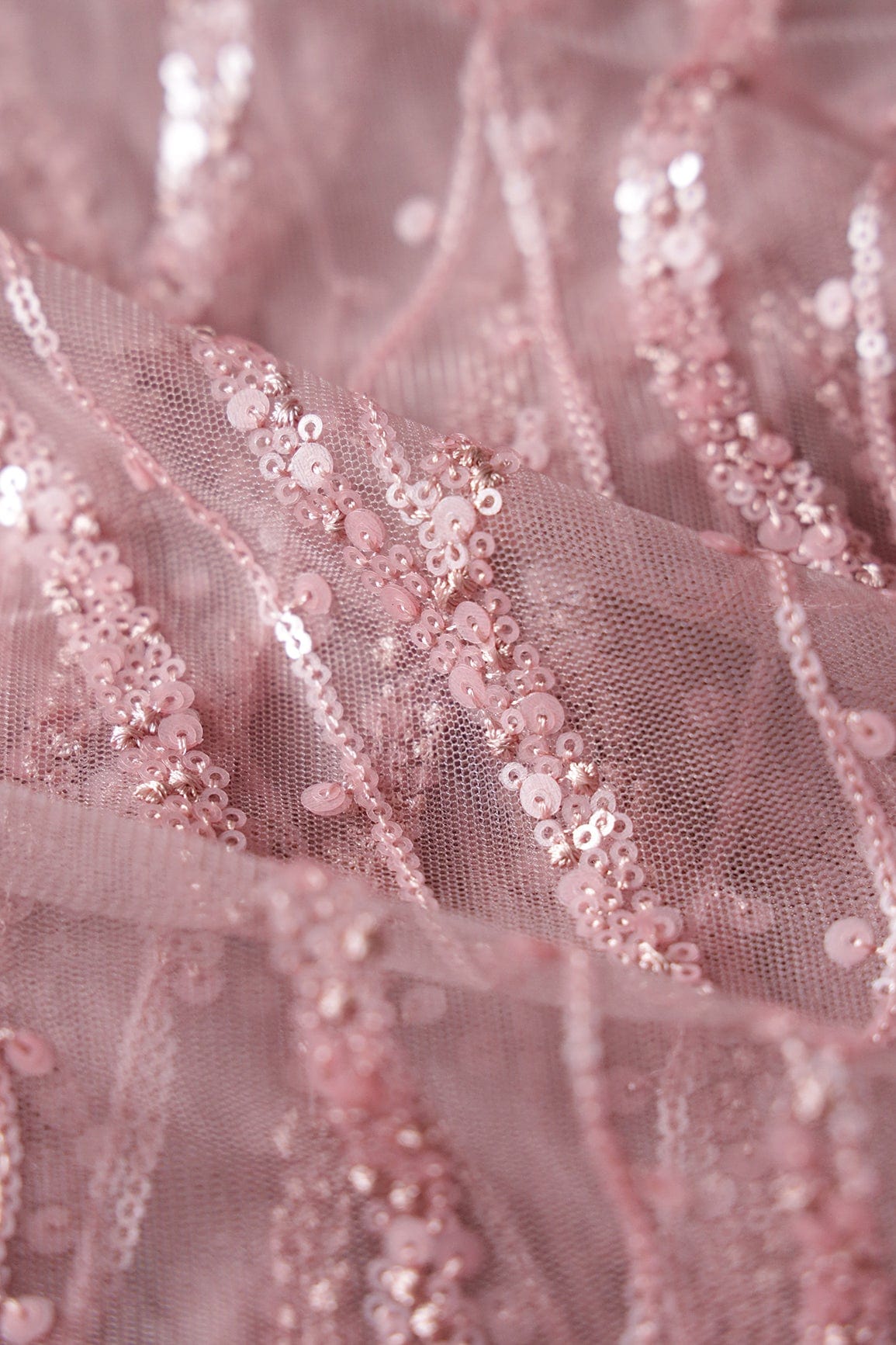 Beautiful Sequins With Mauve Thread Wavy Embroidery Work On Mauve Soft Net Fabric - doeraa