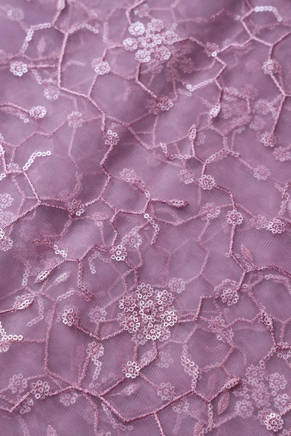 Beautiful Water Sequins Small Floral Embroidery On Mauve Soft Net Fabric - doeraa